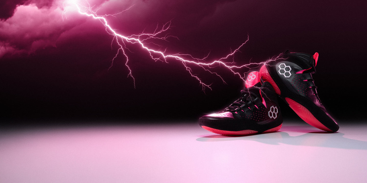 RUDIS Kolat wrestling shoes Volt Pink limited edition colorway with lightning design, built for explosive speed, grip, and elite mat performance