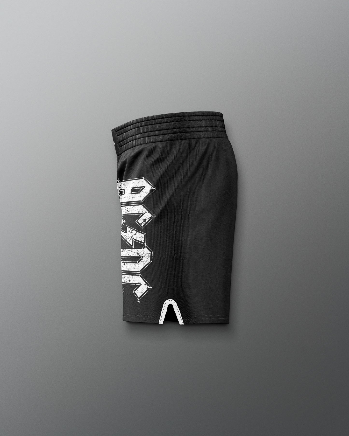 Black shorts with a white logo on a gray background
