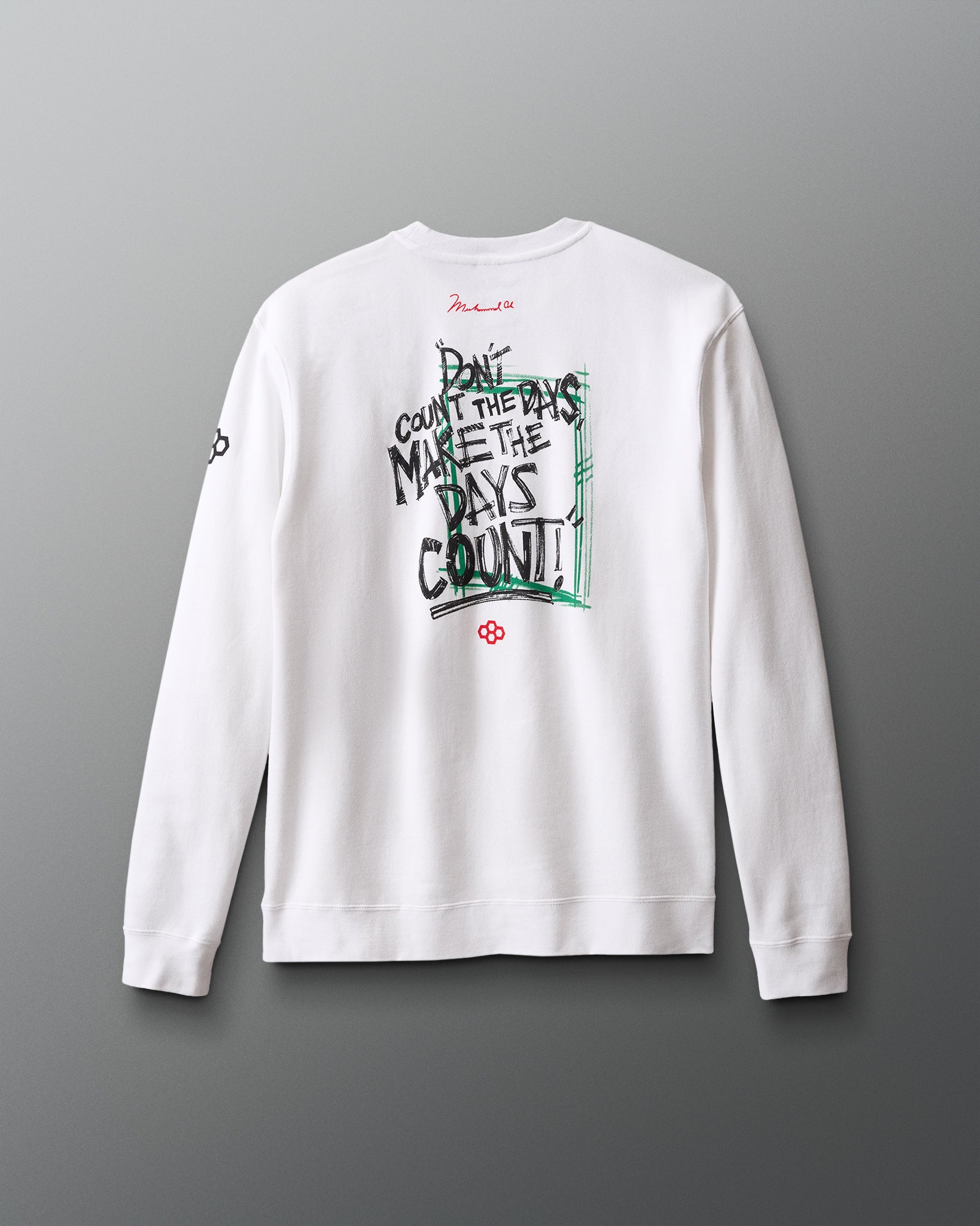 White sweatshirt with text and graphics on the back against a gray background "Don't count the days, make the days count!" Muhammad Ali