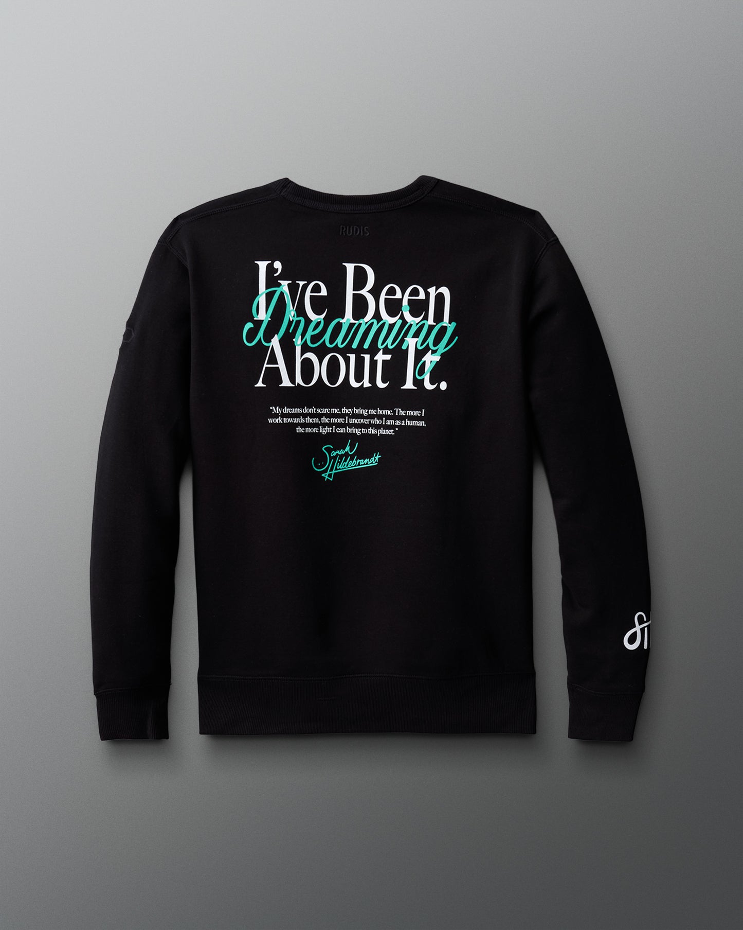 Black sweatshirt with text on a gray background