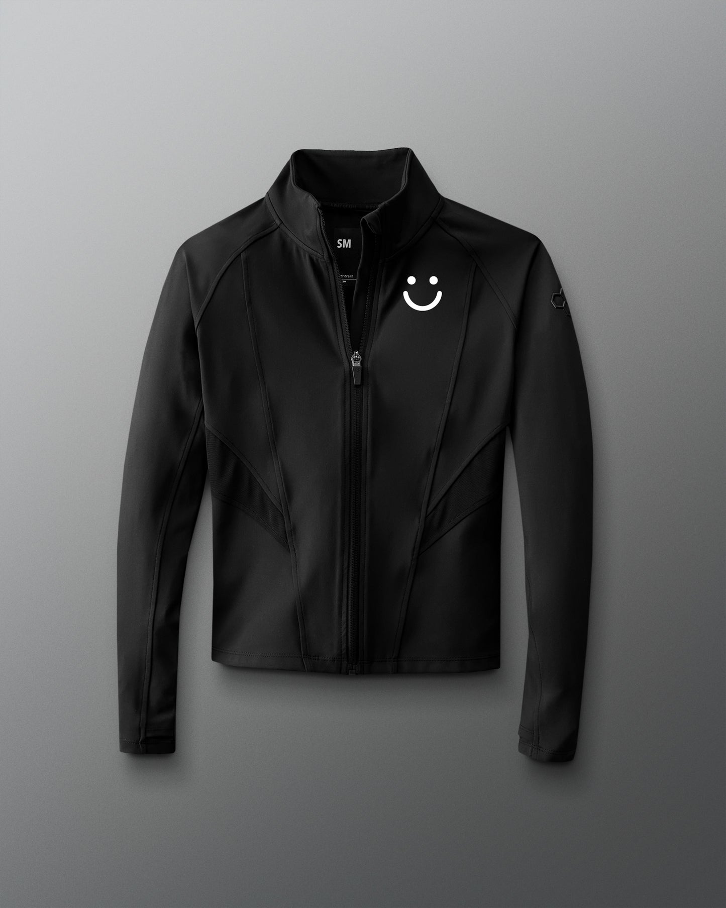 Black jacket with a smiley face logo on a gray background