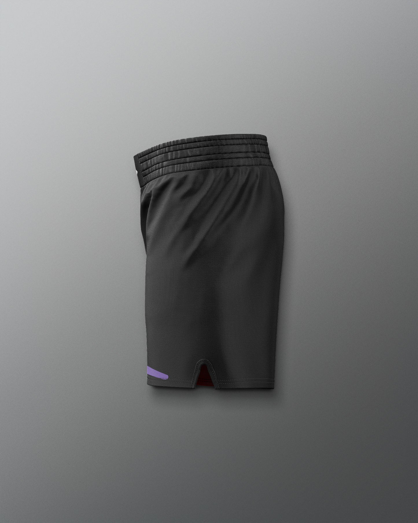 Black athletic shorts on a gray background