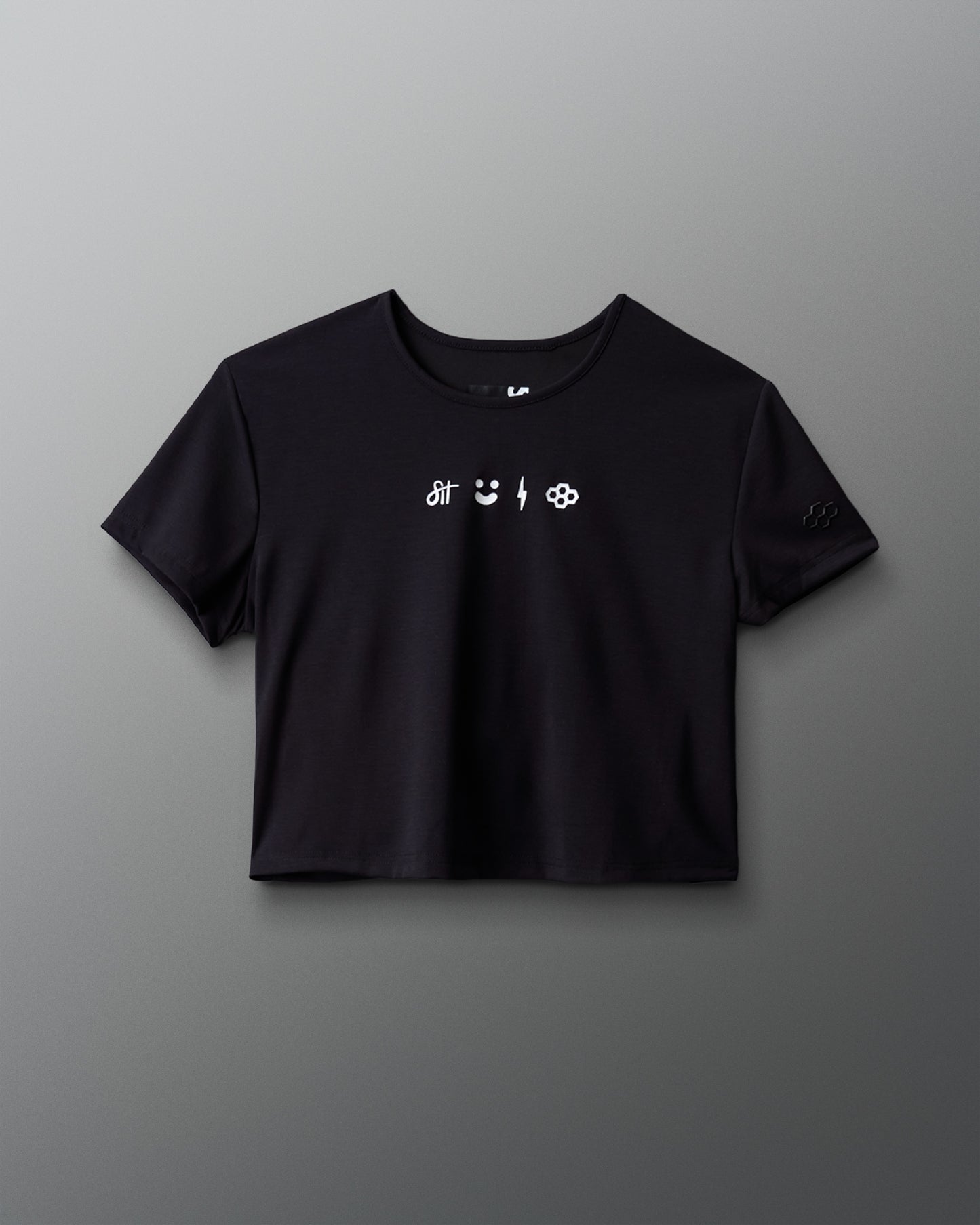Black t-shirt with white text and symbols on a gray background