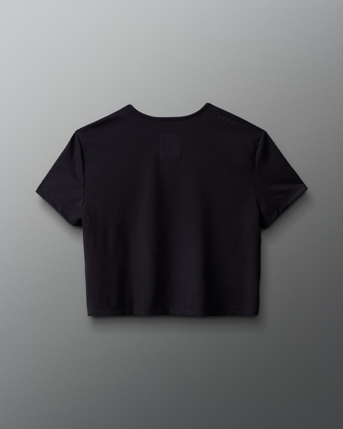 Black t-shirt on a gray background