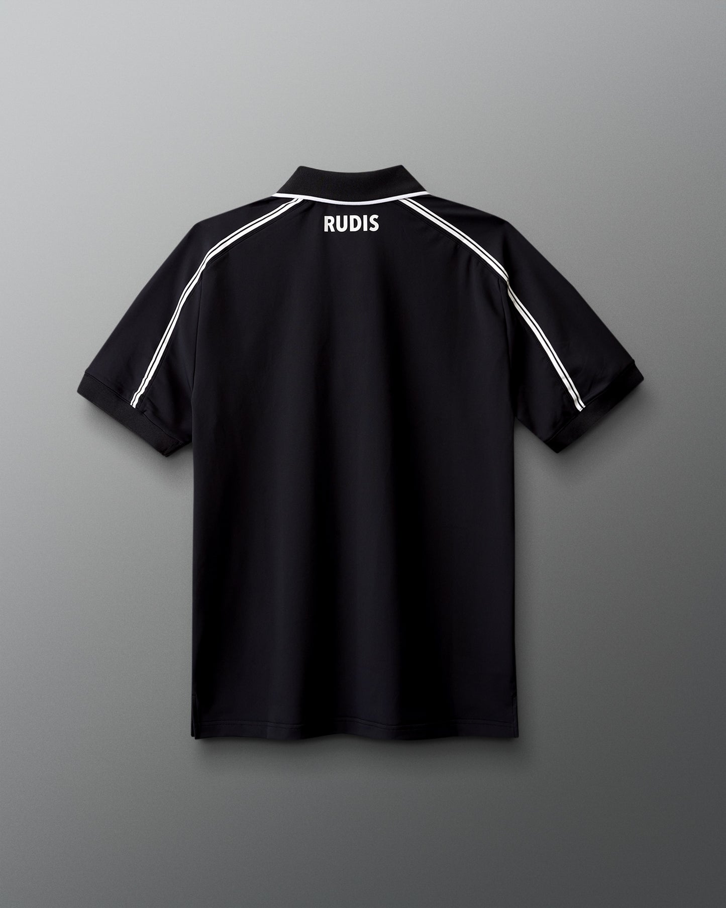 Black polo shirt with 'RUDIS' branding on a gray background
