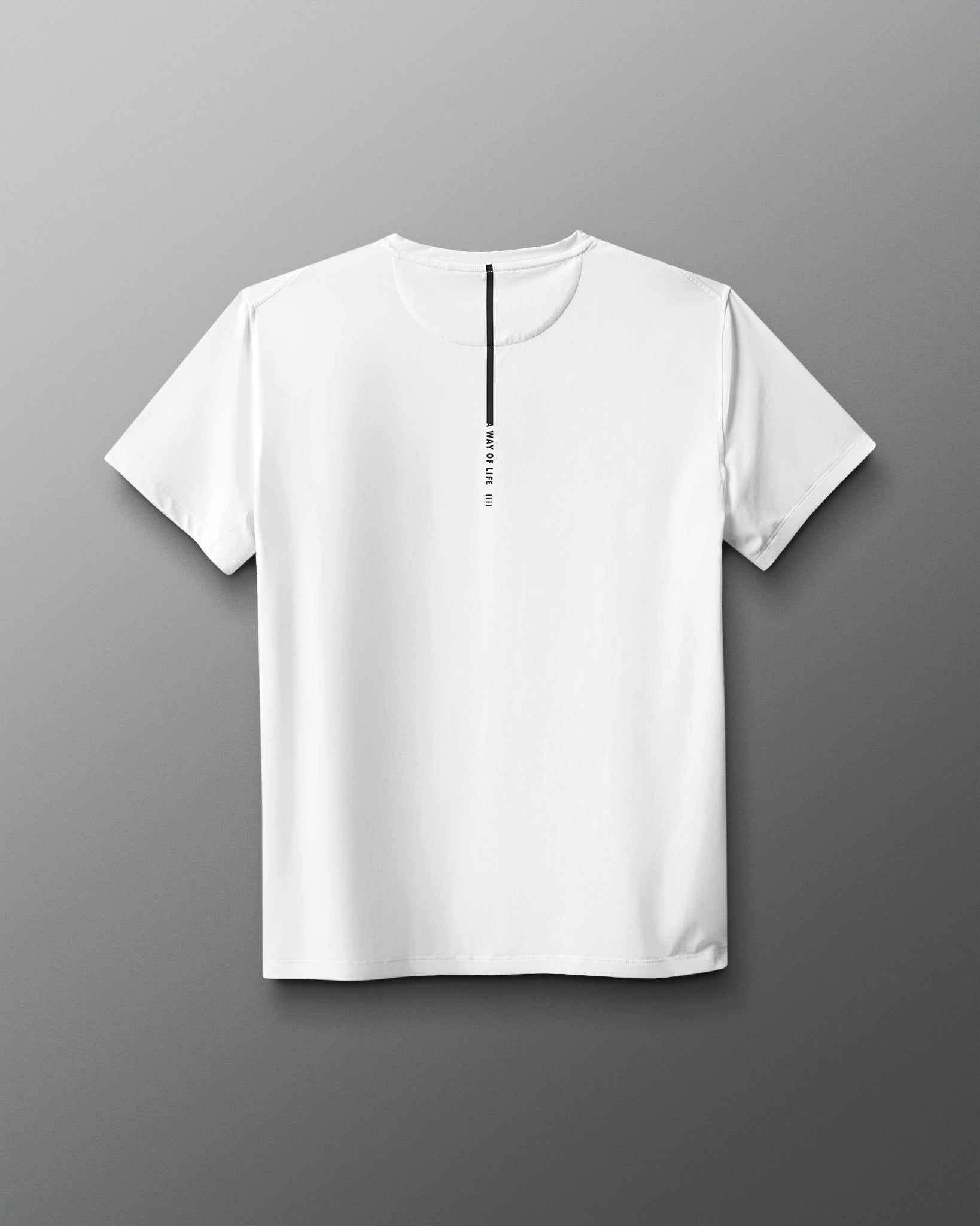 White t-shirt with a small black logo on a gray background