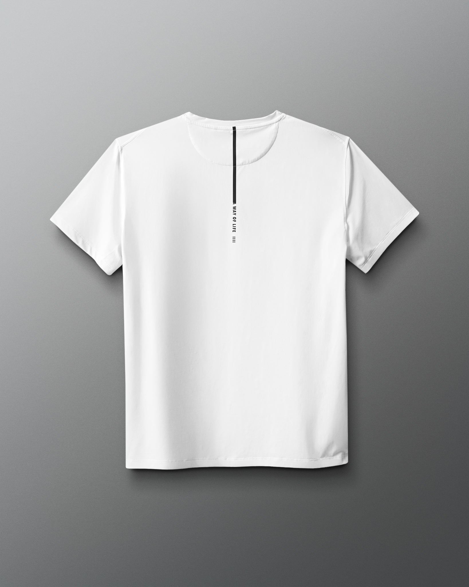 White t-shirt with a small black logo on a gray background