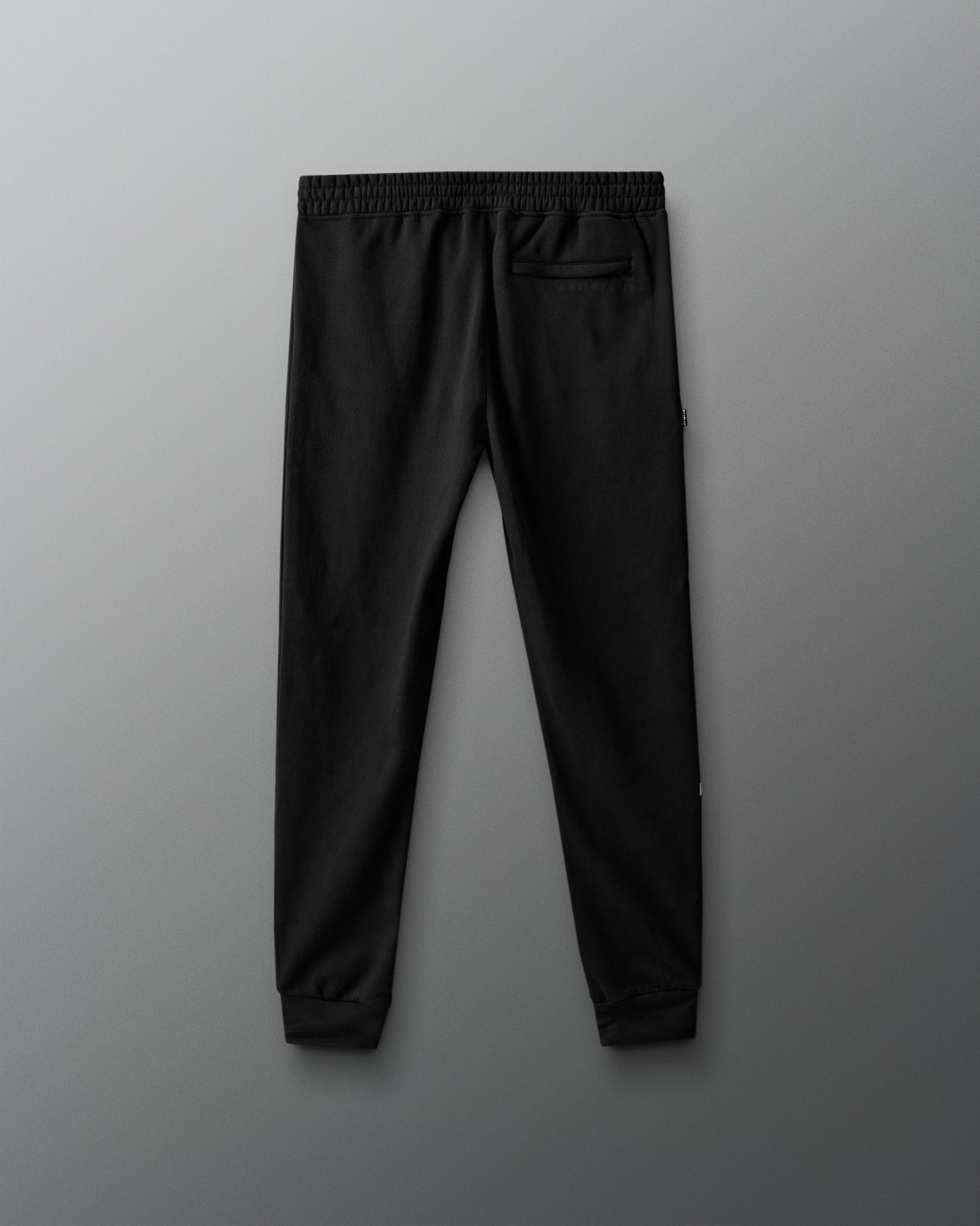 Black pants on a gray background