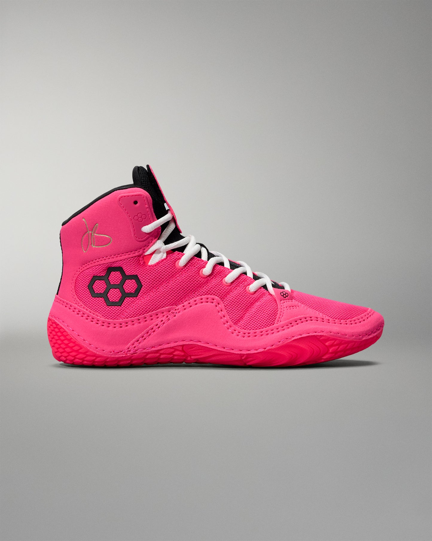 Pink high-top Wrestling shoe with black logo on a gray background