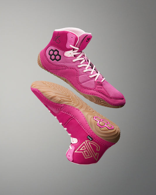 Pink Wrestling Shoes with Black RUDIS Logo and JB Jordan Burroughs signature. JB1 Gum Doubles Wrestling Shoes