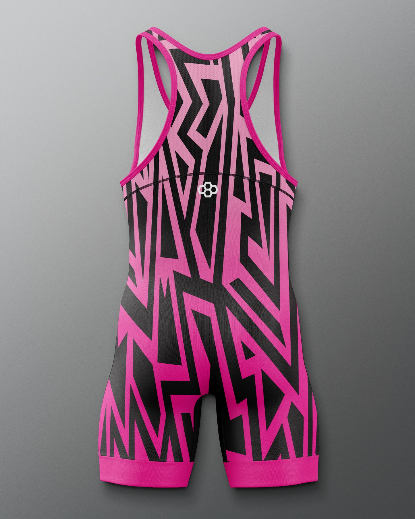Pink and black patterned swimsuit on a gray background