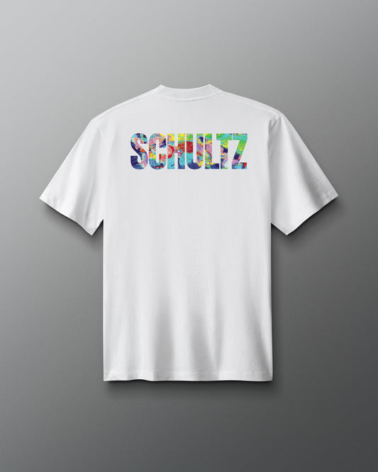 White t-shirt with colorful 'SCHULTZ' logo on the back against a gray background
