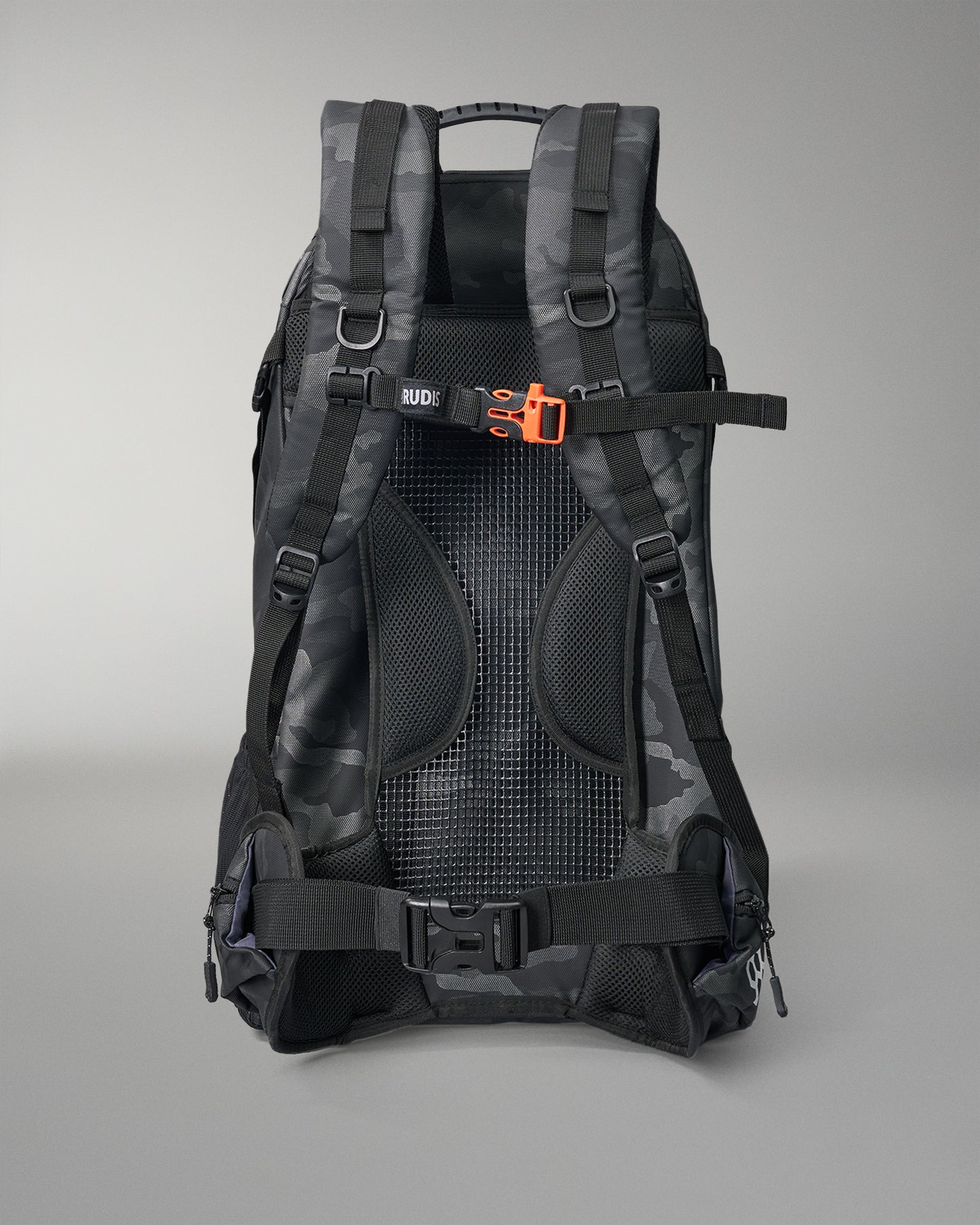 Black backpack with orange accents on a gray background