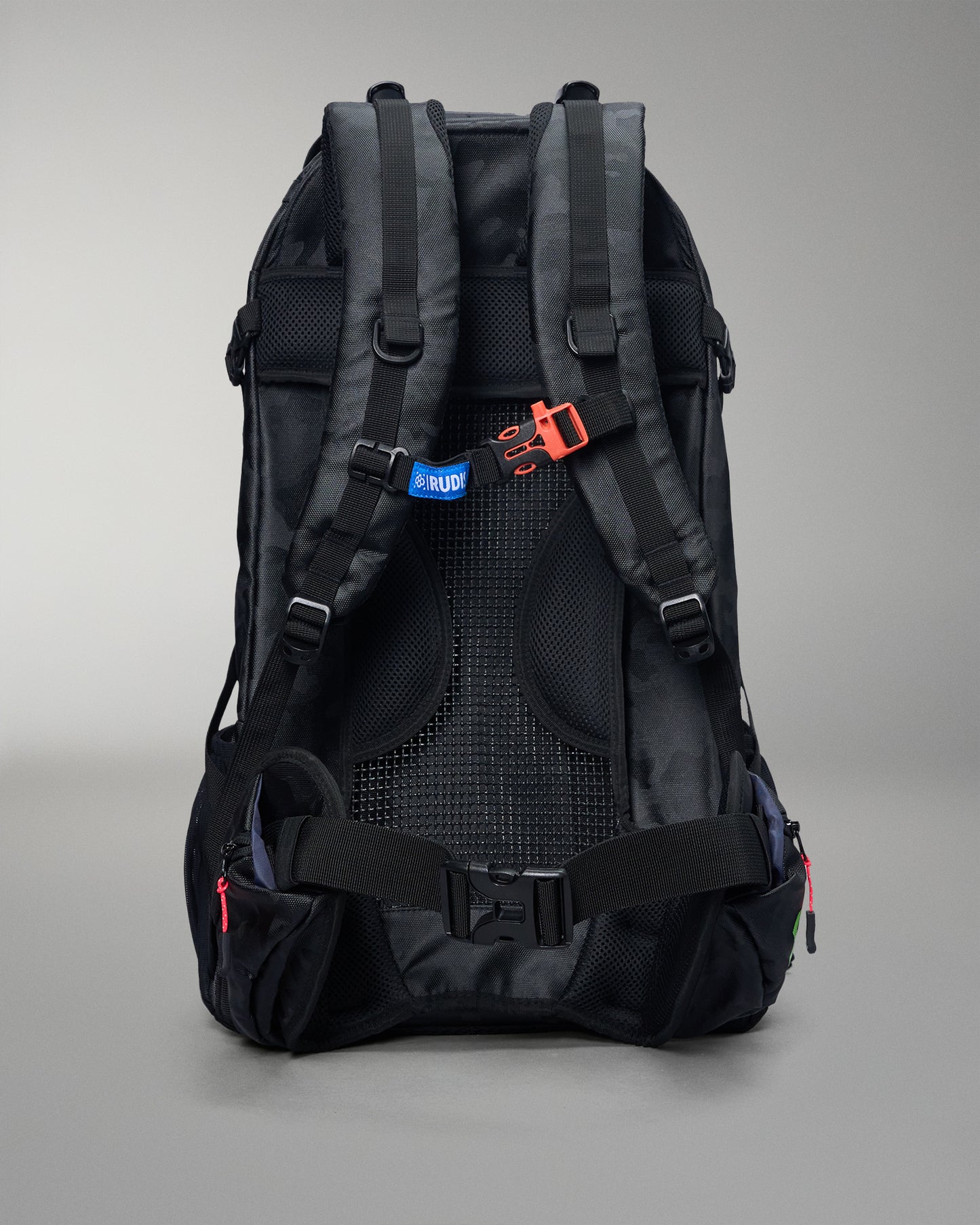 Black backpack with visible branding on a gray background