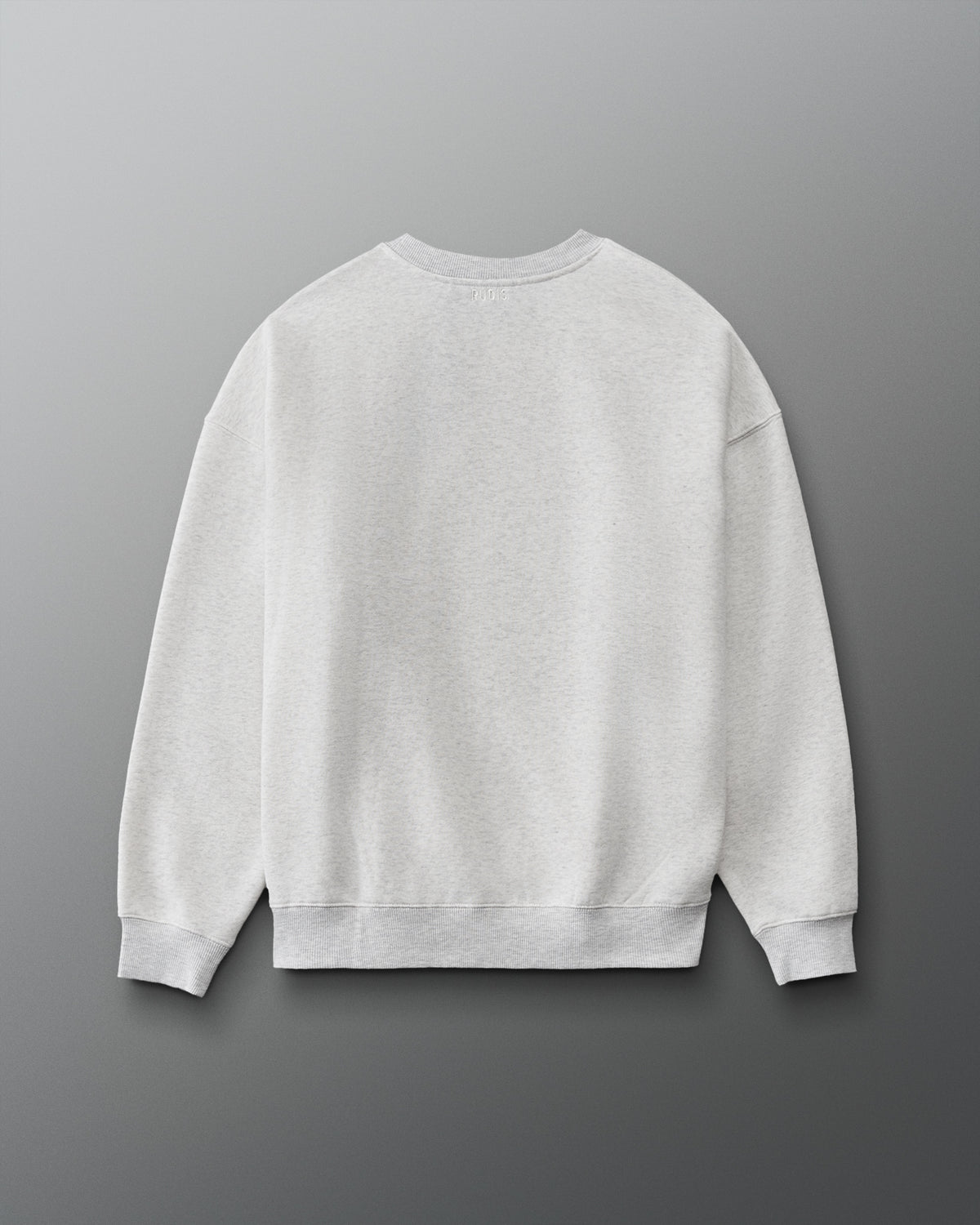 RUDIS Hex Relaxed Comfort Fleece Crewneck in Heather Silver, back view showing a clean minimalist design, subtle RUDIS branding below the collar, dropped shoulders, and ribbed cuffs and hem. Copy Alt Text