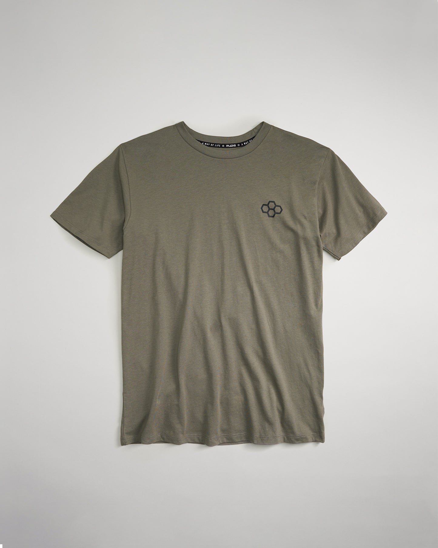 This image displays a minimalist olive green t-shirt featuring a small decorative logo on the left chest area set against a light backdrop