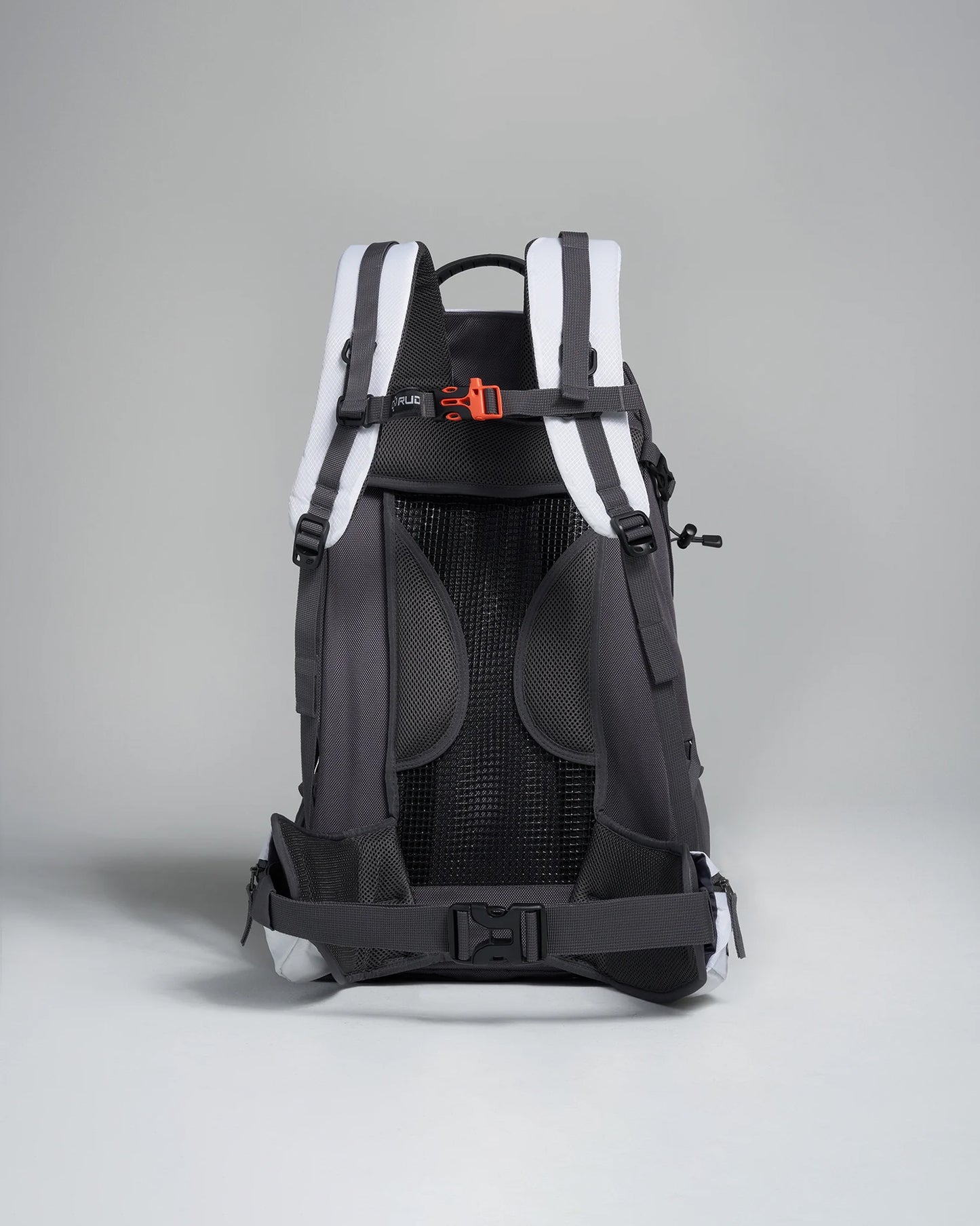 A sleek backpack featuring a dark design with white accents and ergonomic back support suitable for hiking or daily use