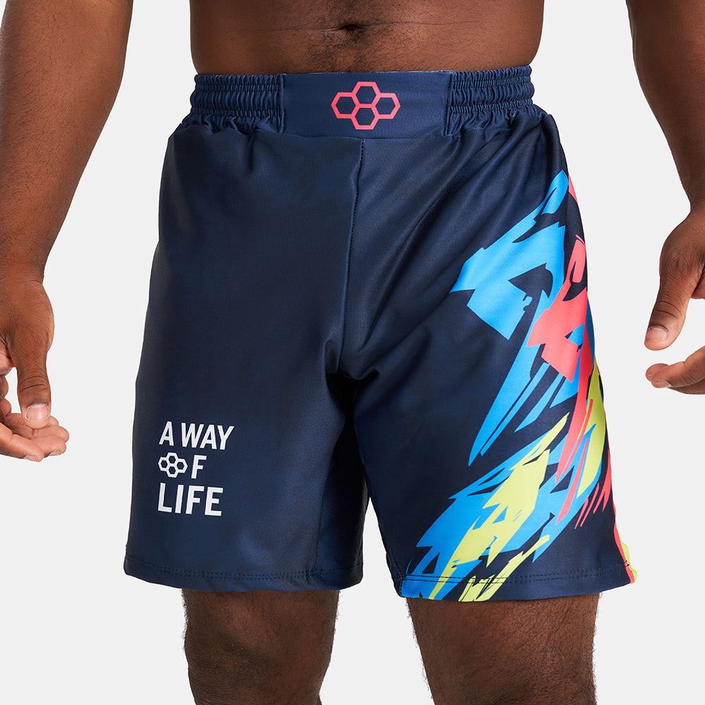 Vibrant navy swim shorts featuring a colorful abstract design and motivational text