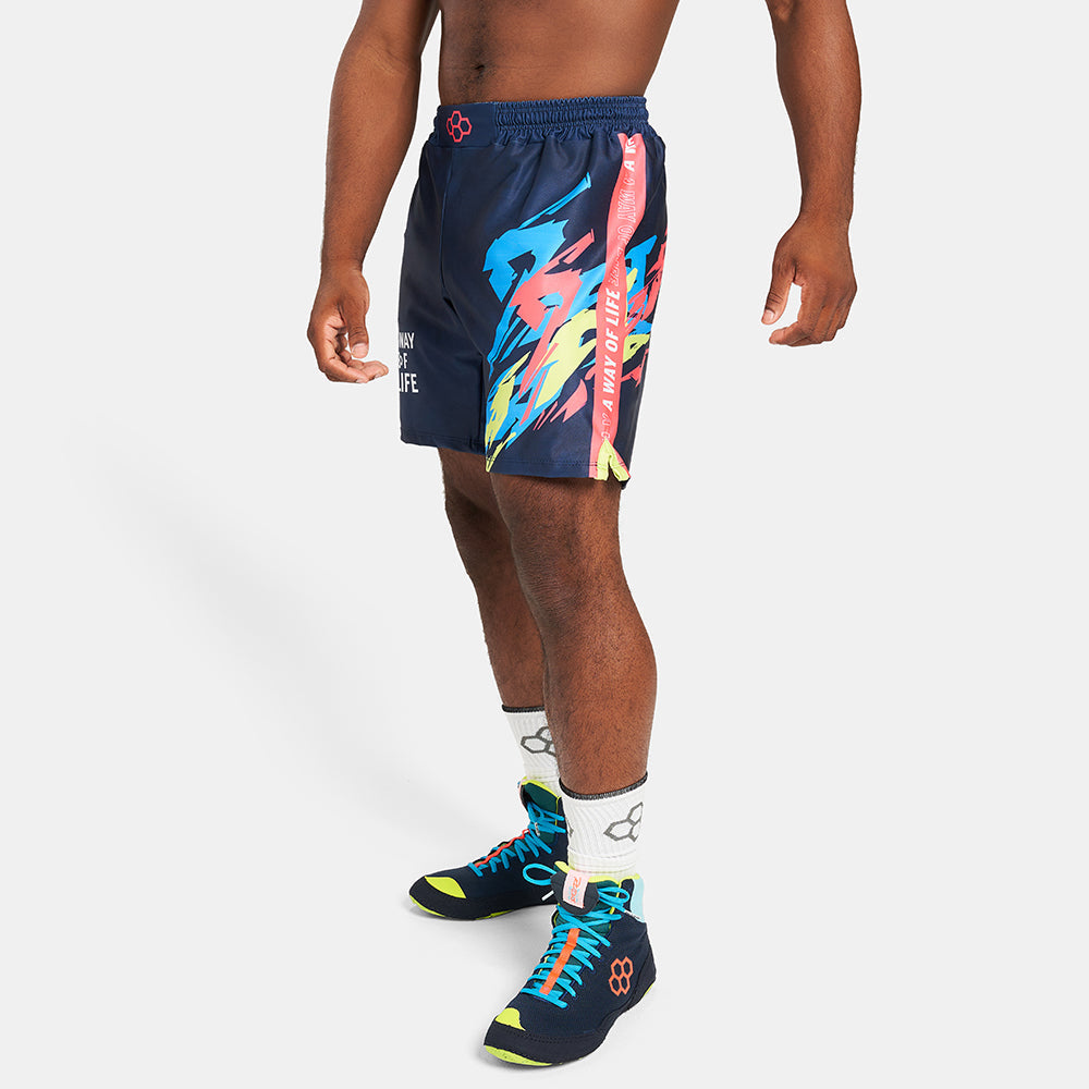 A male athlete wearing colorful athletic shorts and stylish sneakers showcasing a modern sportswear look