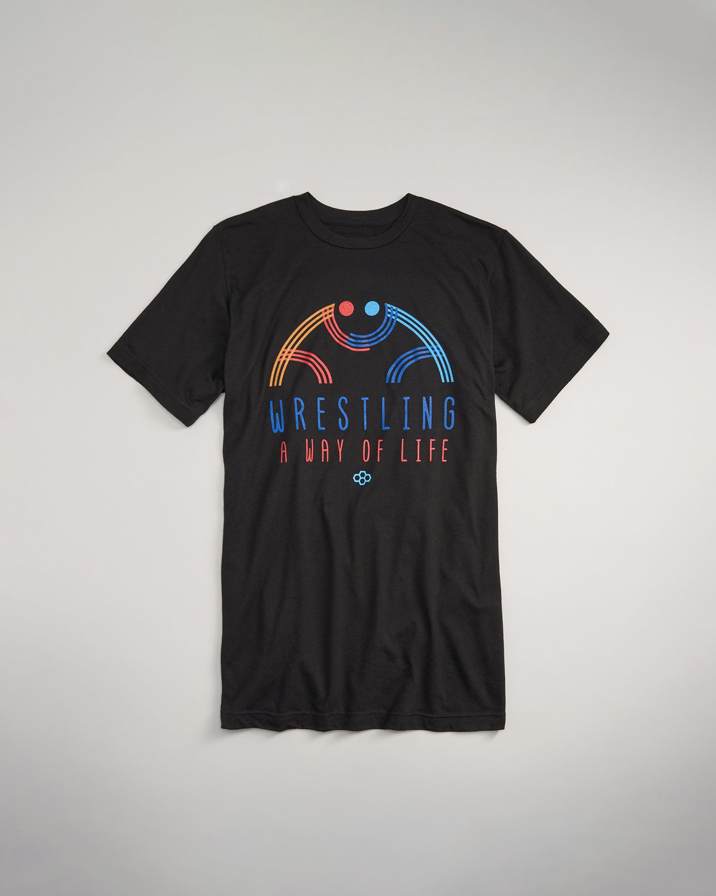 A black t-shirt featuring colorful graphic text and designs celebrating wrestling as a lifestyle