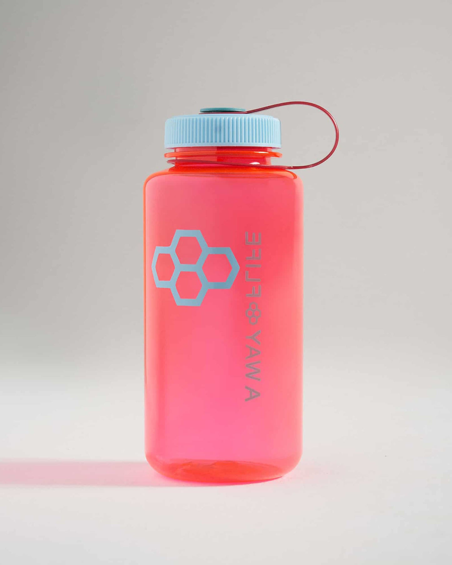 Vibrant pink water bottle with a light blue lid and honeycomb logo perfect for hydration on the go