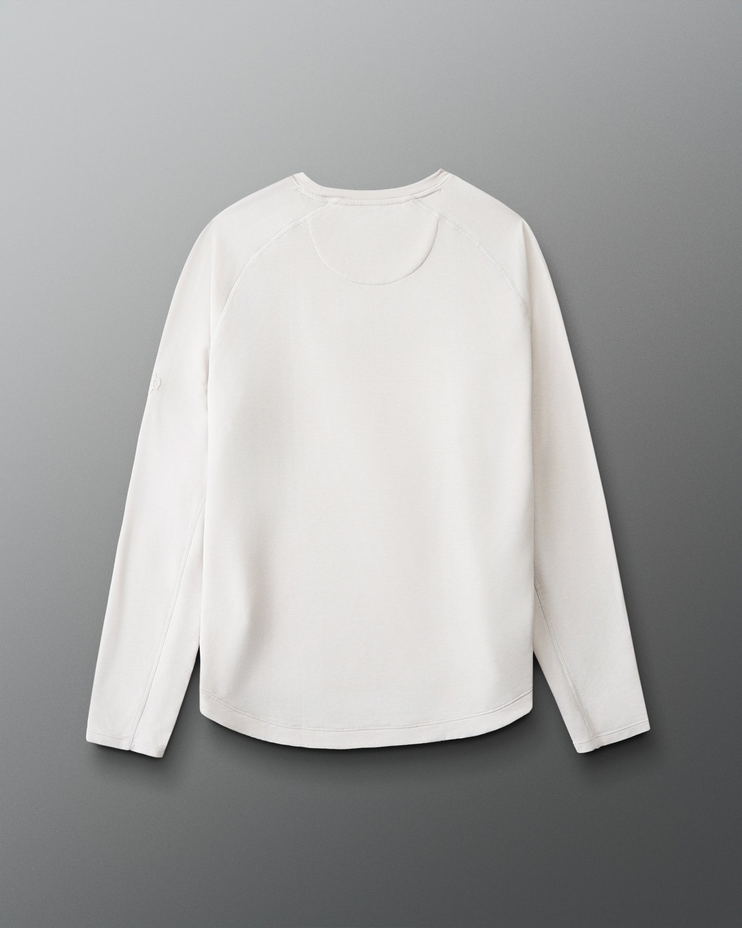 White long-sleeve shirt on a gray background