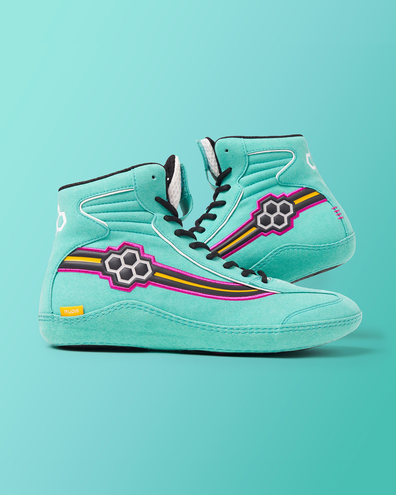 A vibrant pair of high-top sneakers in turquoise with colorful detailing showcasing a unique design ideal for both style and comfort