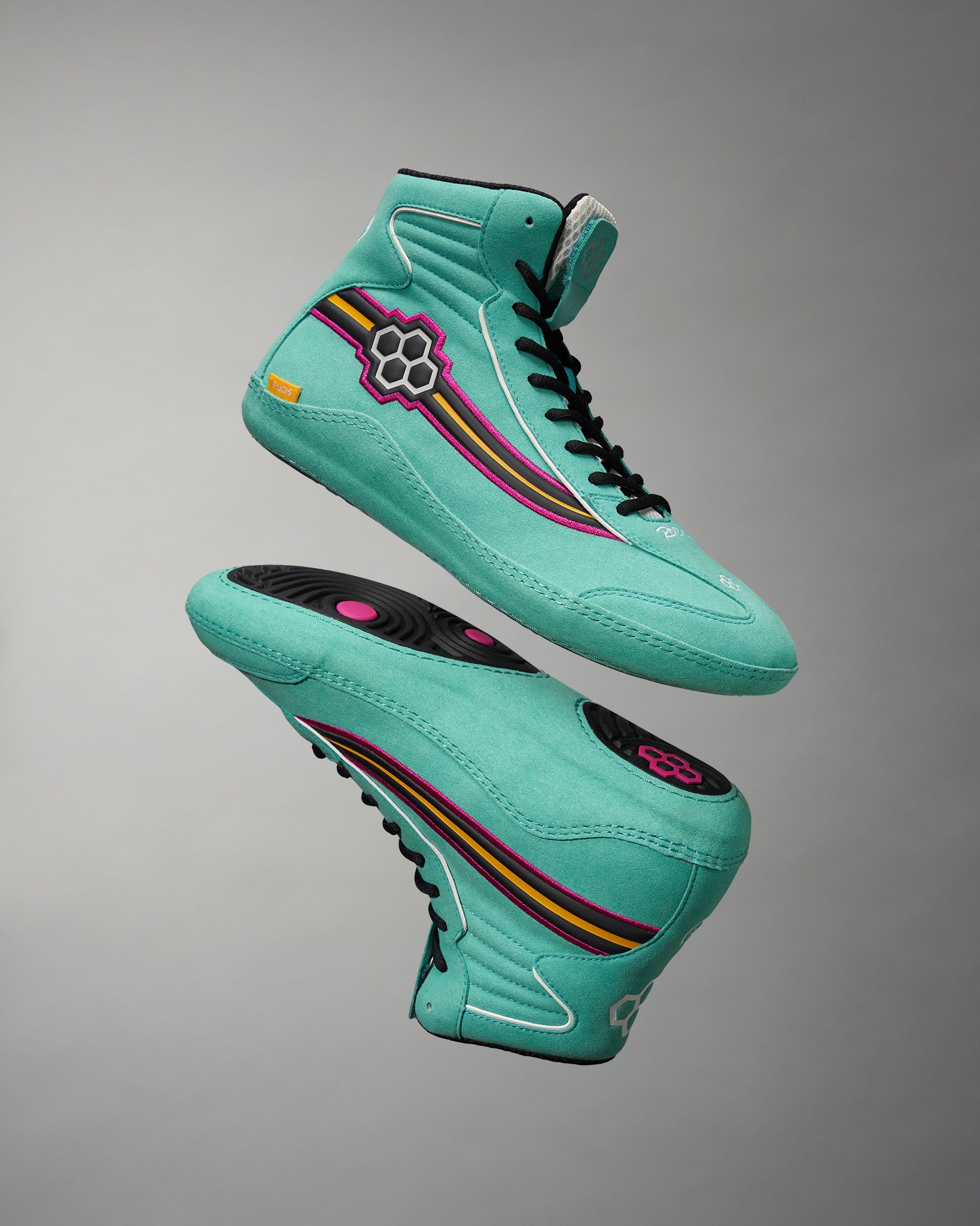 A pair of vibrant teal high-top sneakers featuring unique multicolored stripes and a distinctive logo design