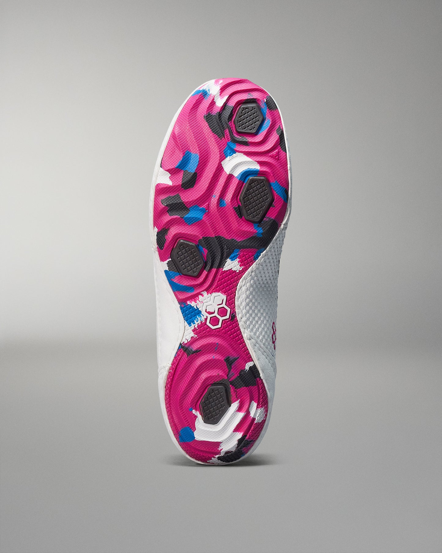 The underside of a RUDIS Colt 3 Wrestling Shoes in black, red, and gold, featuring a dynamic burst pattern and gold logo