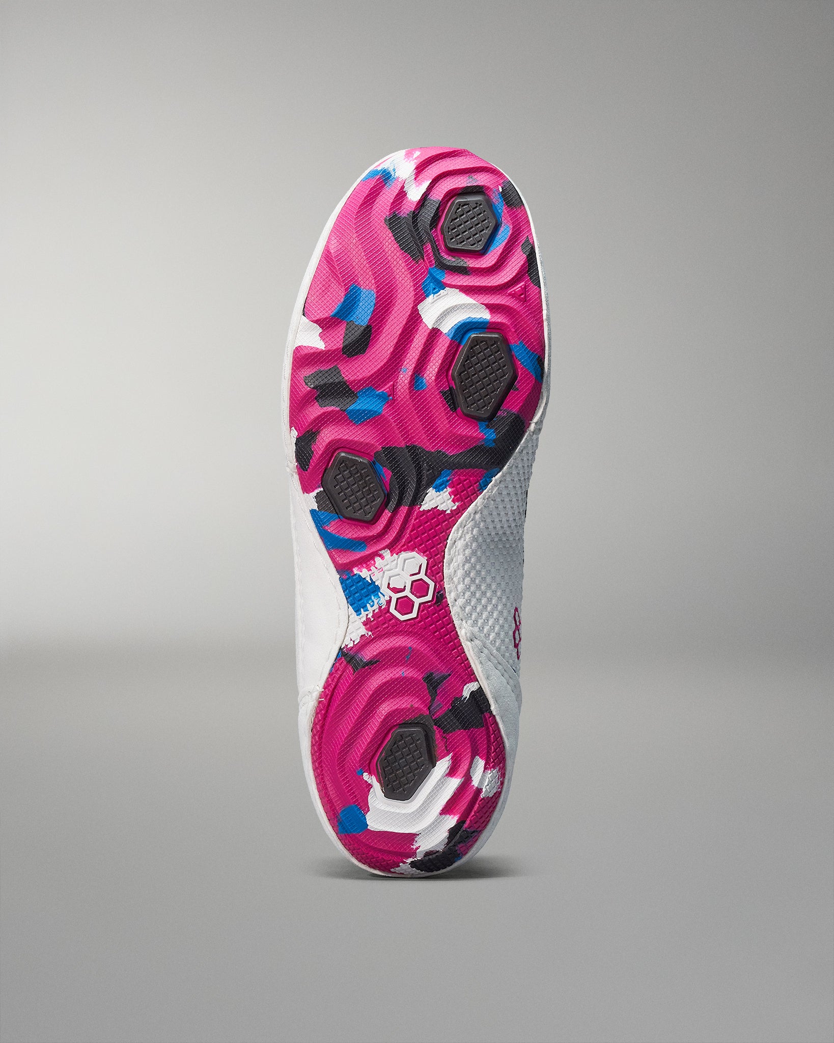 The underside of a RUDIS Colt 3 Wrestling Shoes in black, red, and gold, featuring a dynamic burst pattern and gold logo