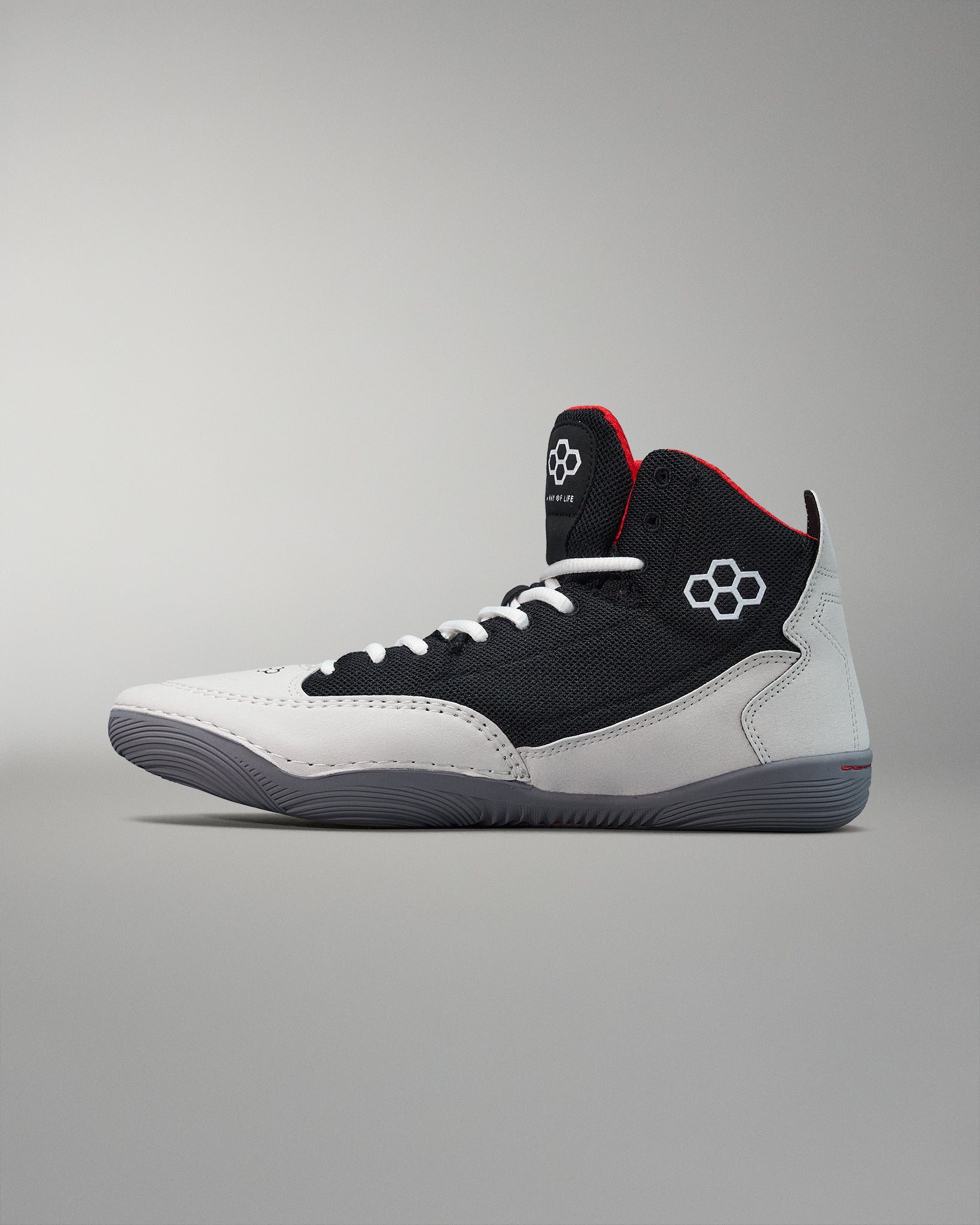 Inside view - RUDIS adult wrestling shoes with black, white, and red colors, featuring a micro-suede rand, and wrapped outsole