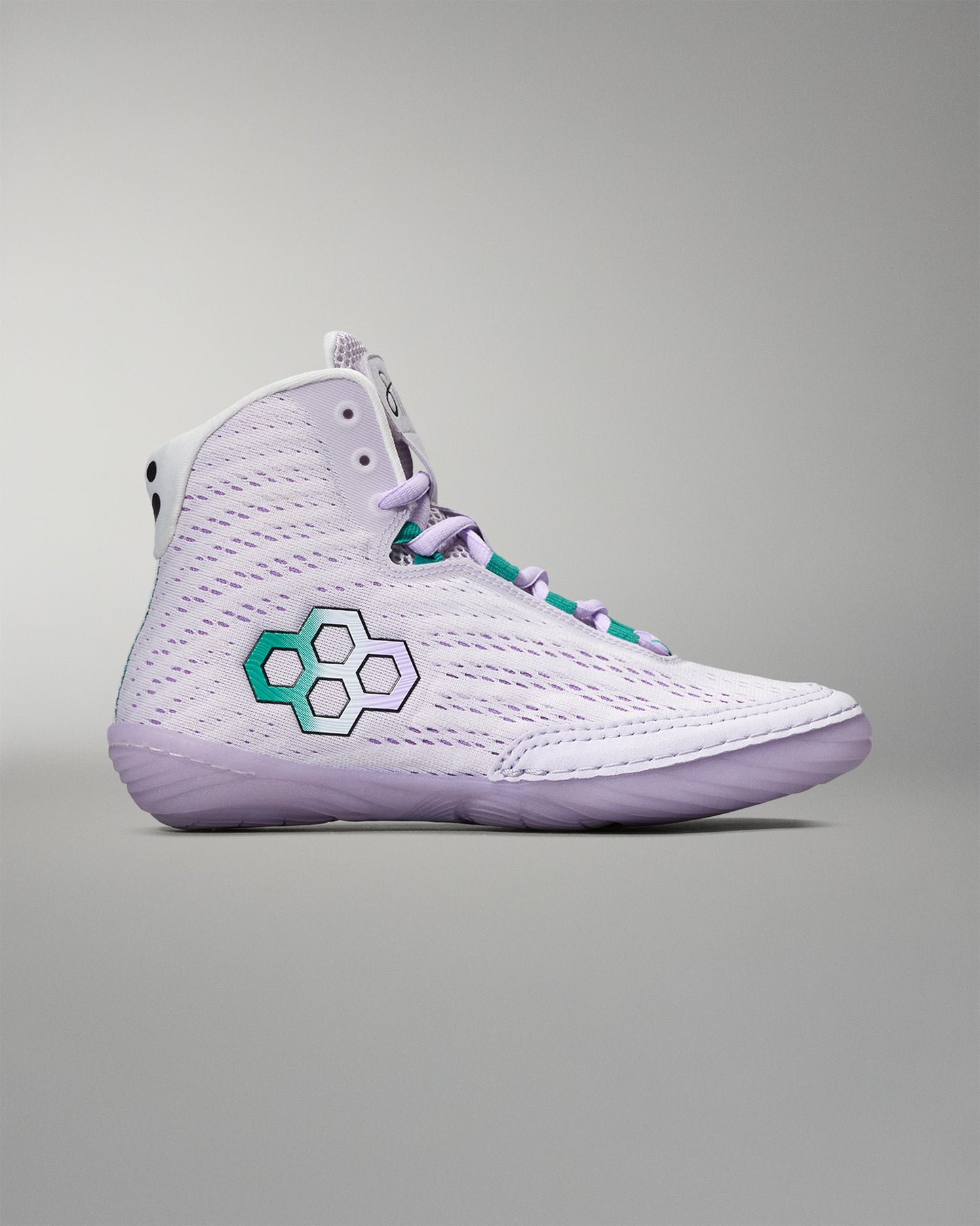 White high-top sneaker with a green and white logo on a gray background