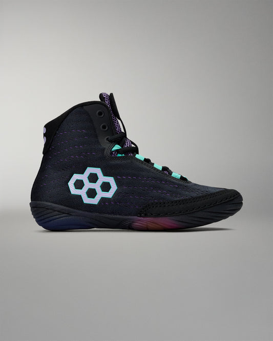 Black high-top sneaker with a unique logo on a gray background