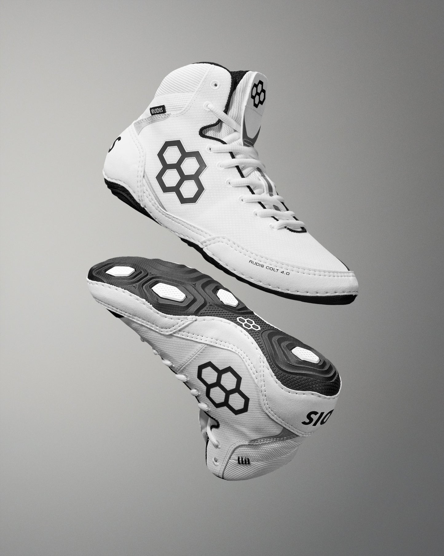 White Wrestling shoe with black accents on a gray background