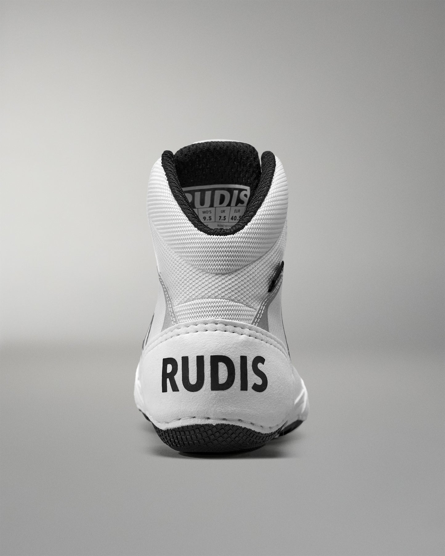 White Wrestling shoe with 'RUDIS' branding on a gray background