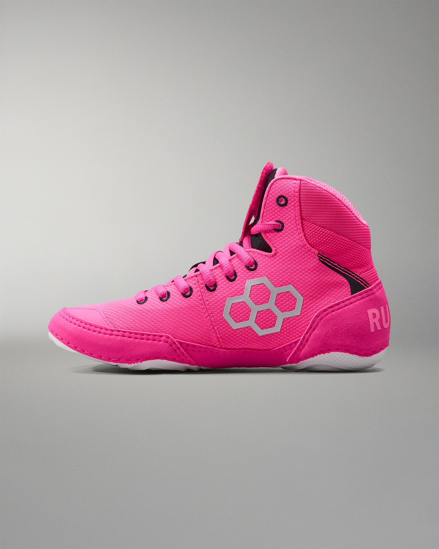 Pink high-top sneaker with a brand logo on a gray background