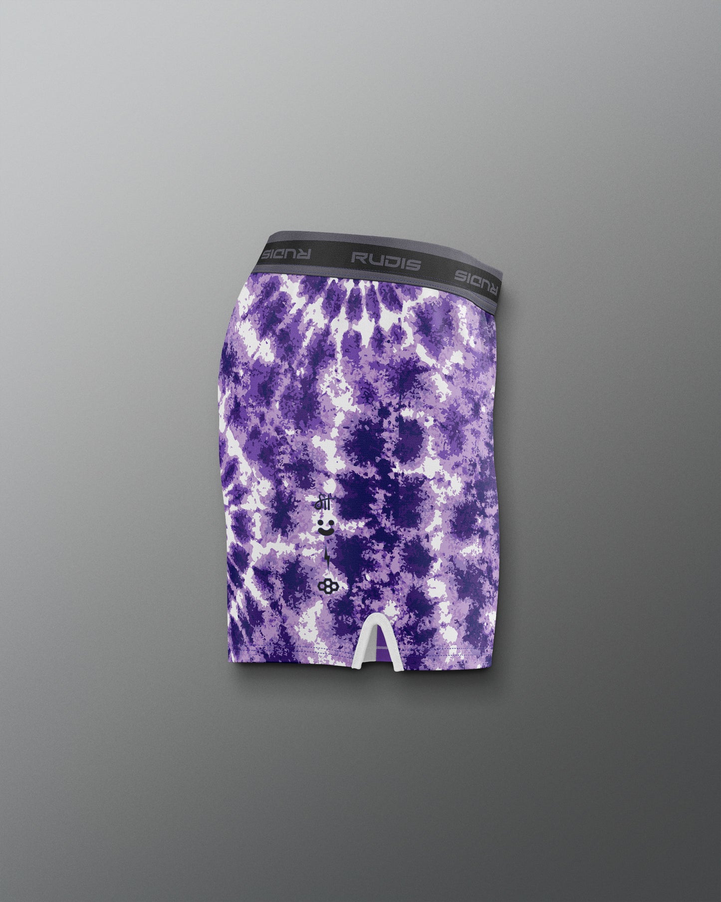 Purple tie-dye shorts with a brand logo on a gray background