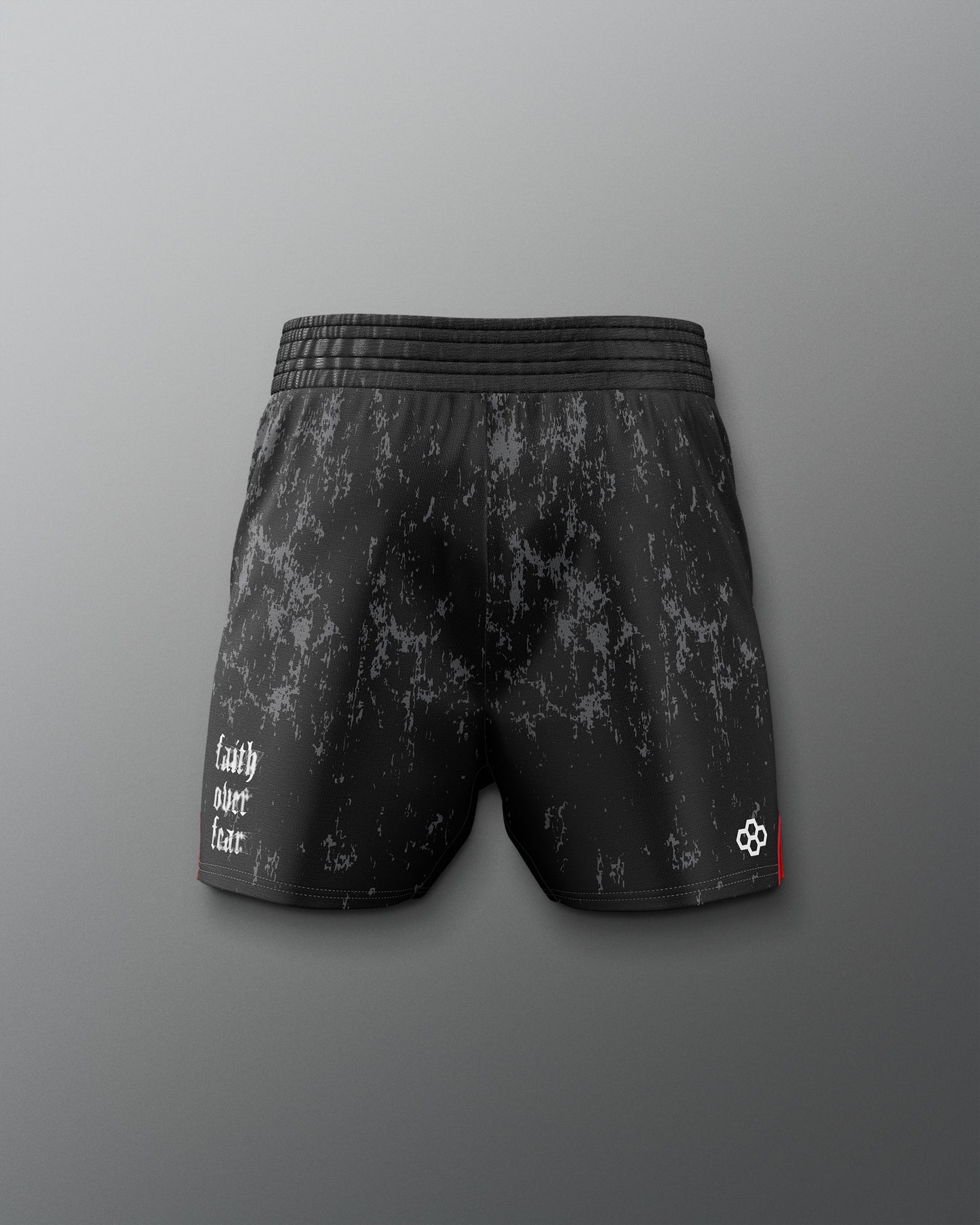 Black patterned shorts on a gray background