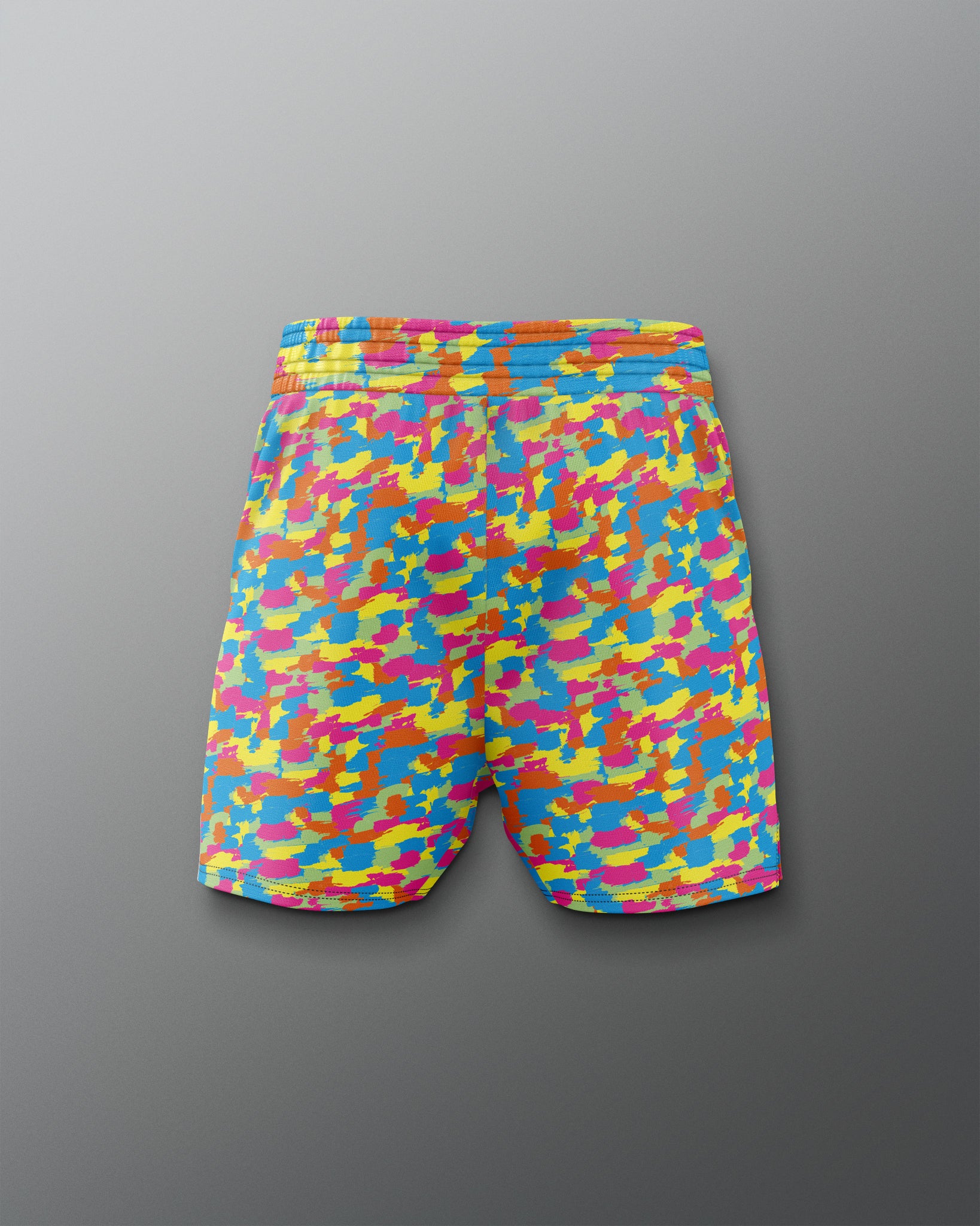 Colorful camouflage-patterned shorts on a gray background