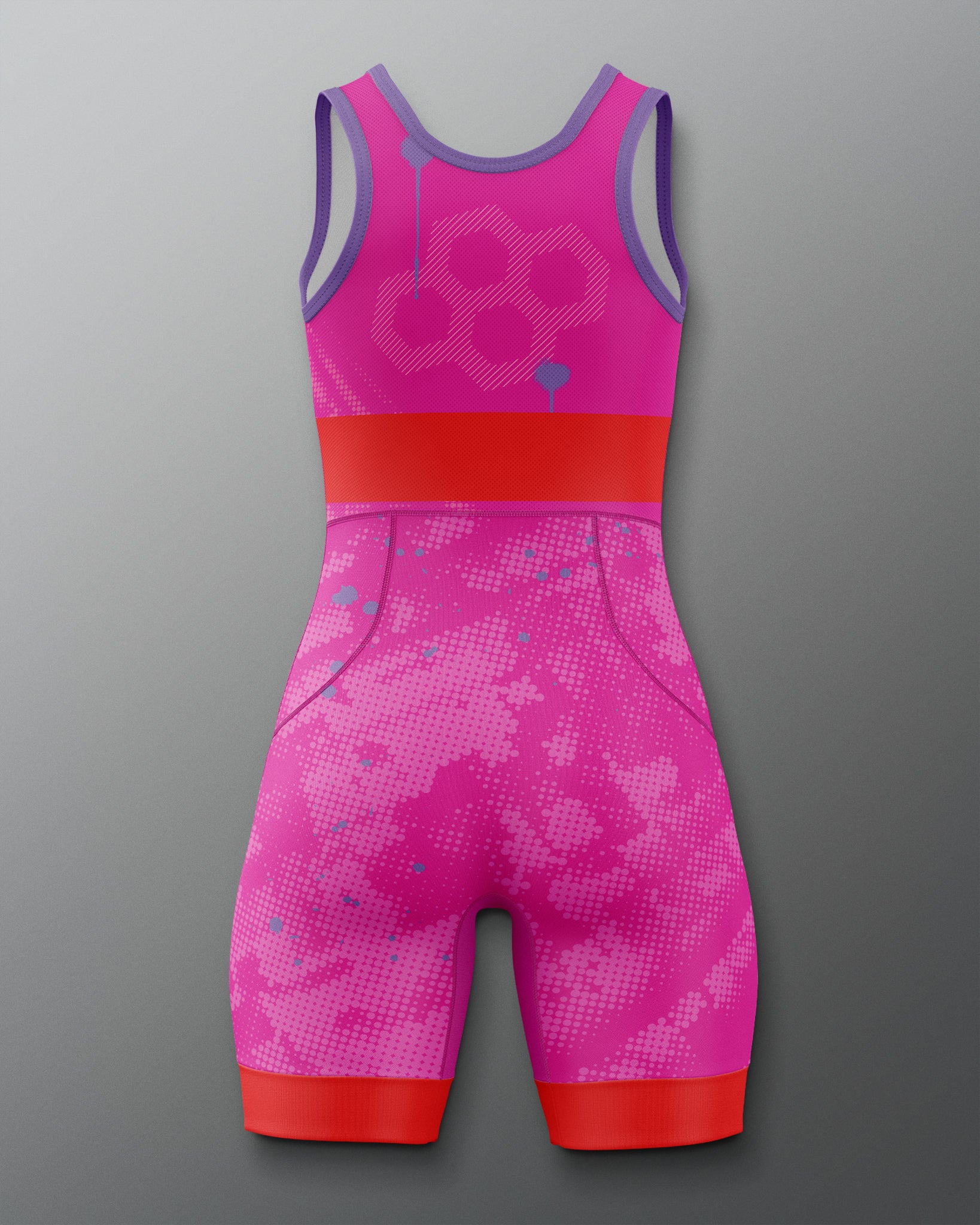 Back view of the RUDIS Strive Women’s Elite 2.0 Wrestling Singlet in pink with purple trim, showcasing a clean racerback design with pink and red leg detailing and a subtle dotted texture pattern.