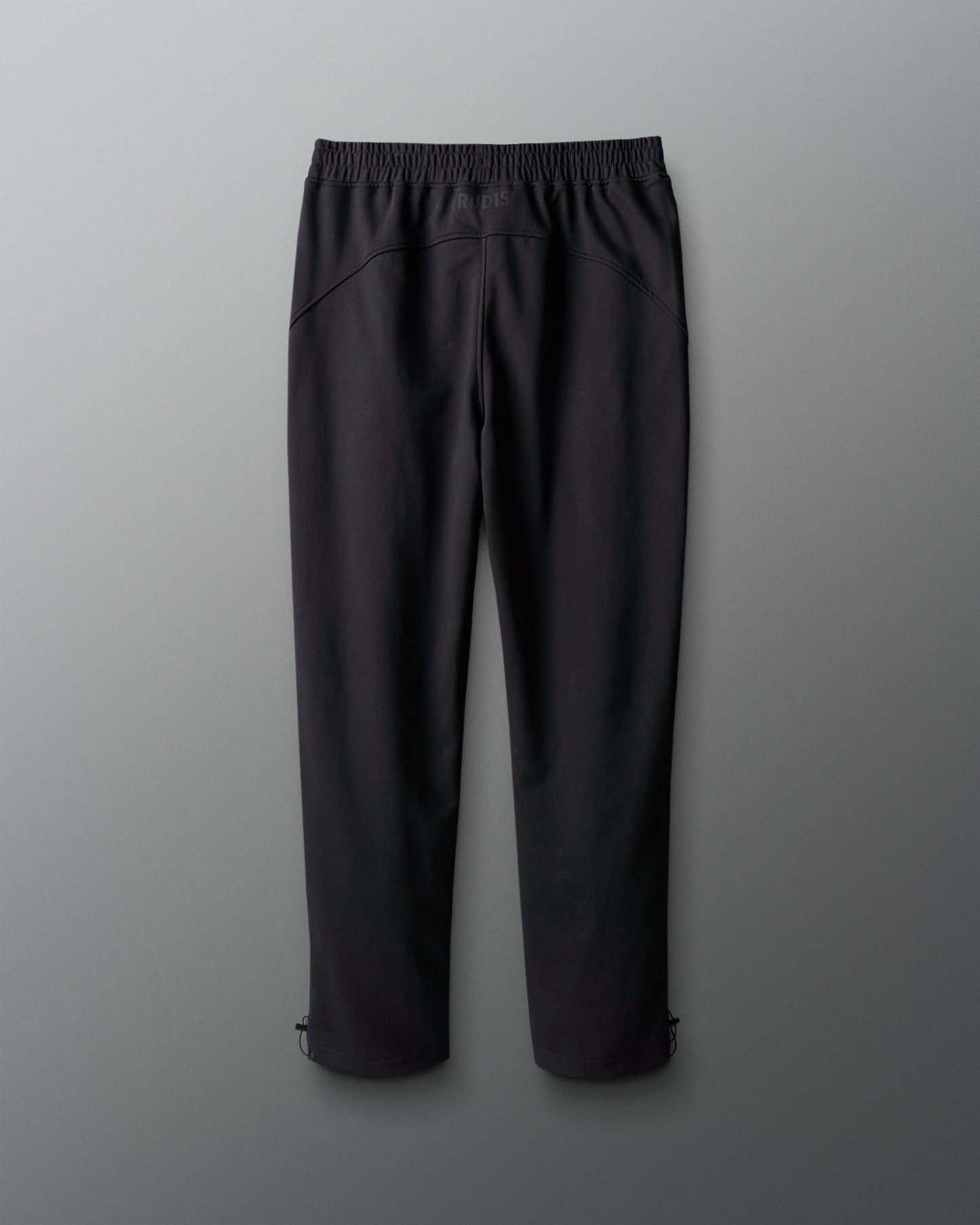 Black pants on a gray background