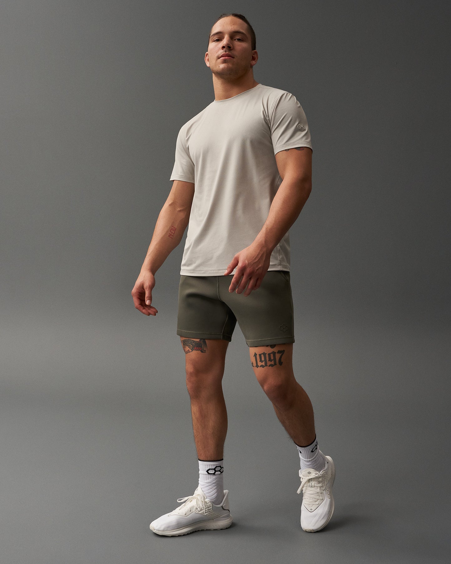 A textured t-shirt displayed against a neutral background.