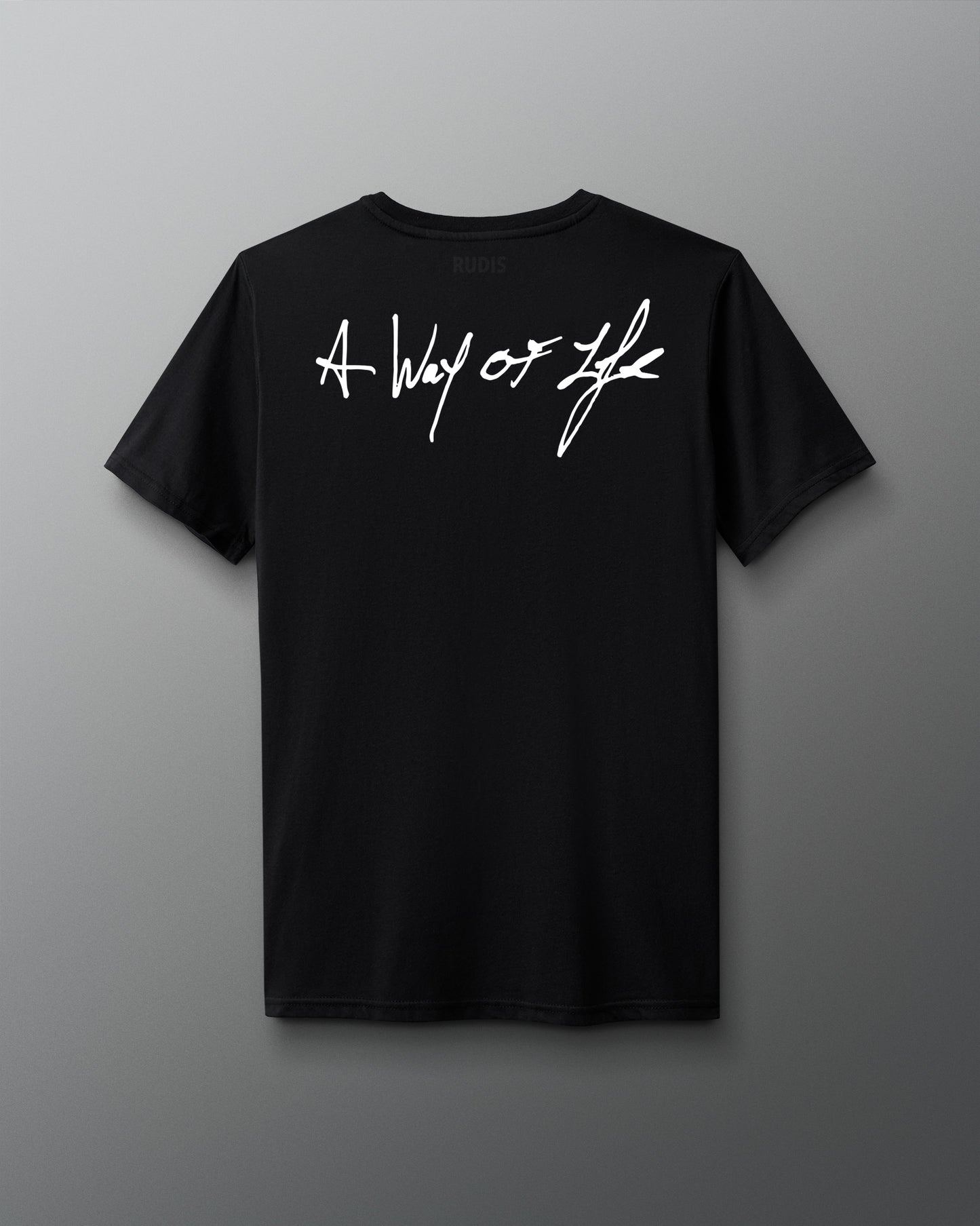 Back view of a black T-shirt with the phrase ‘A Way of Life’ printed in large white handwritten-style script across the upper back.