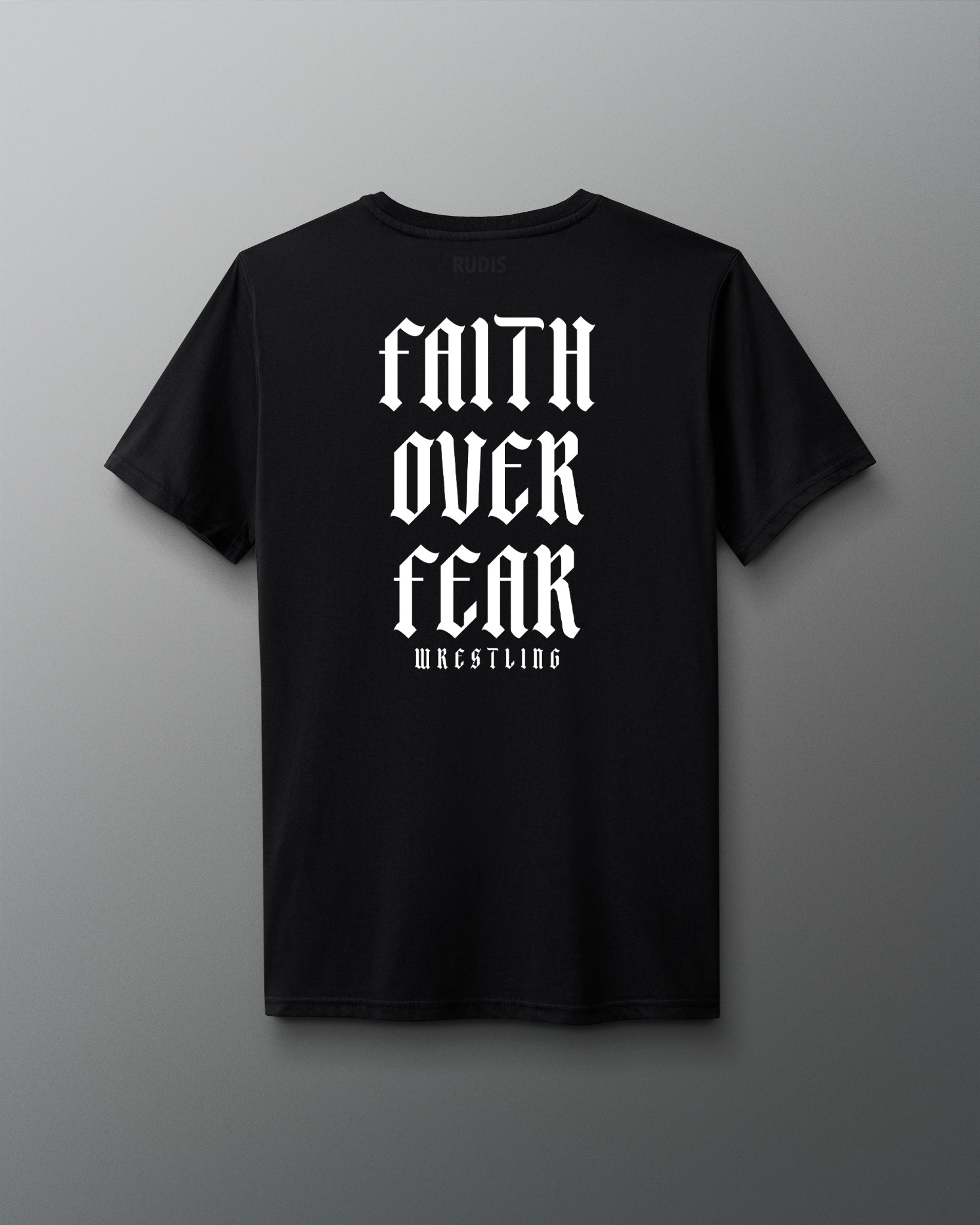 Back view of a black T-shirt featuring bold white gothic-style text that reads ‘Faith Over Fear Wrestling’ stacked vertically.