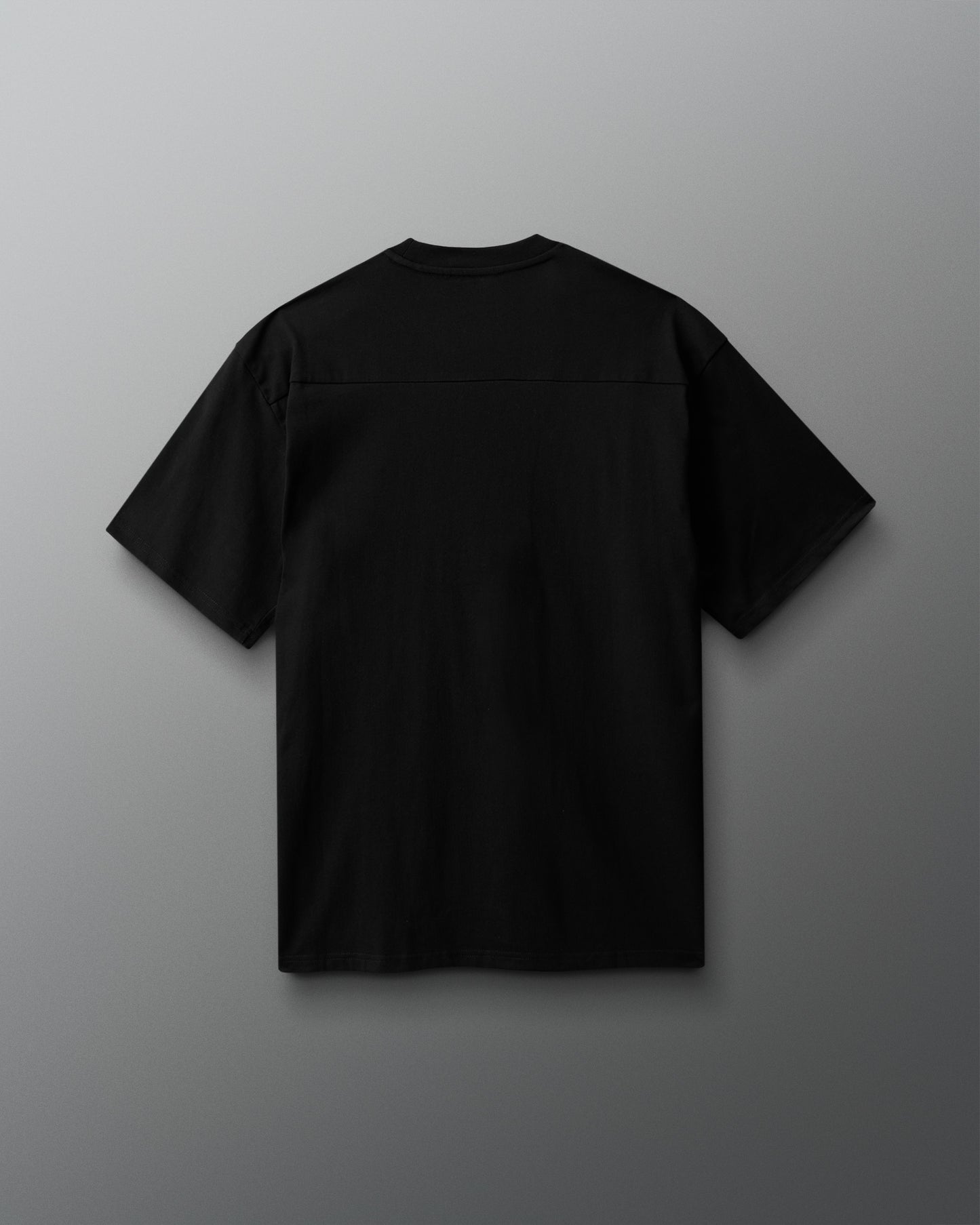 Black t-shirt on a gray background