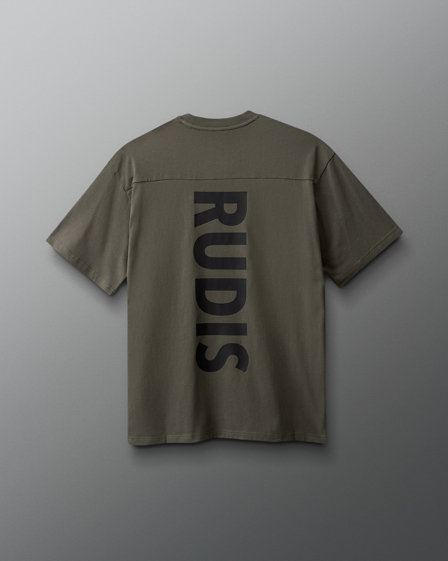 Green shirt with 'RUDIS' logo on the back against a gray background