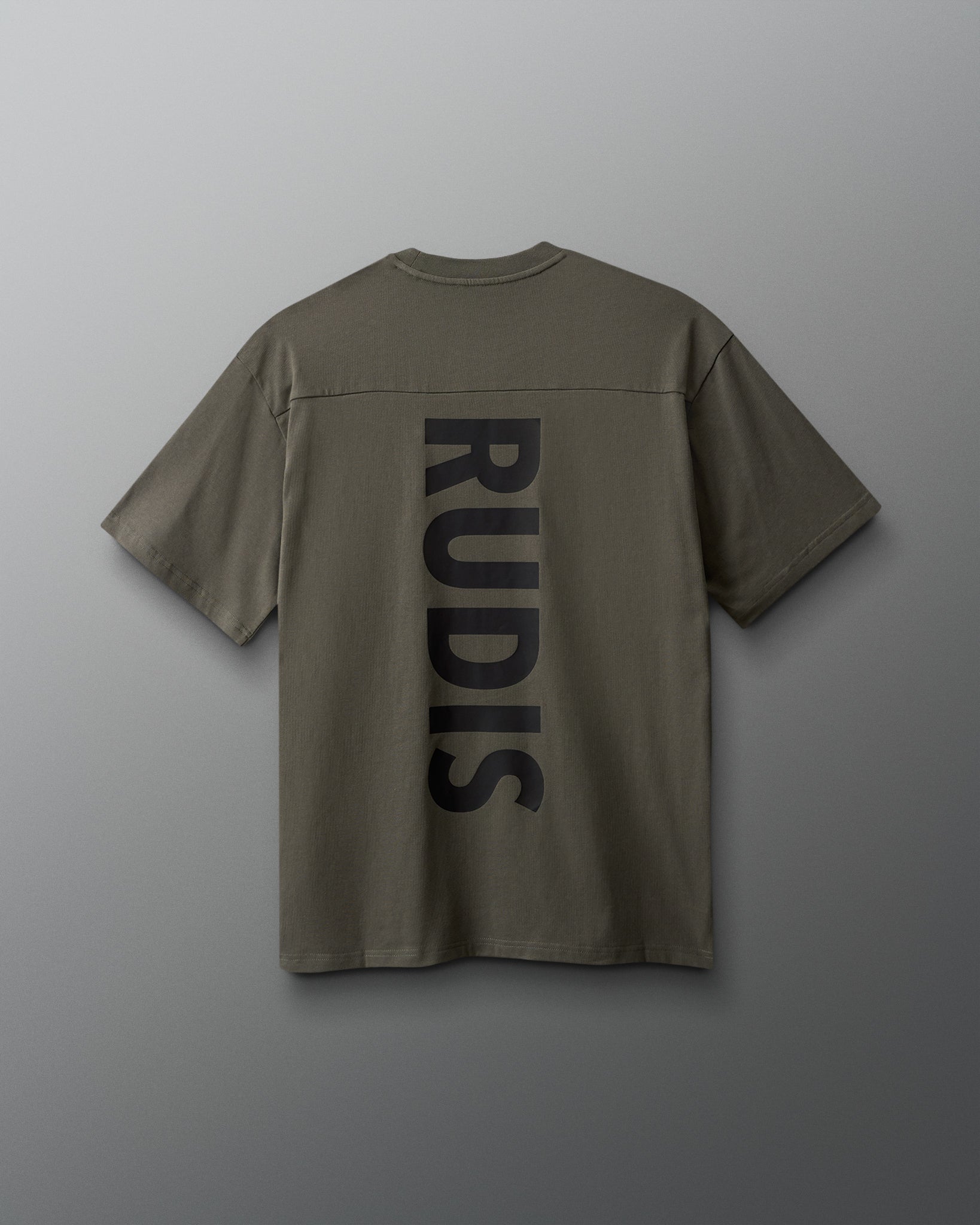 Green shirt with 'RUDIS' logo on the back against a gray background