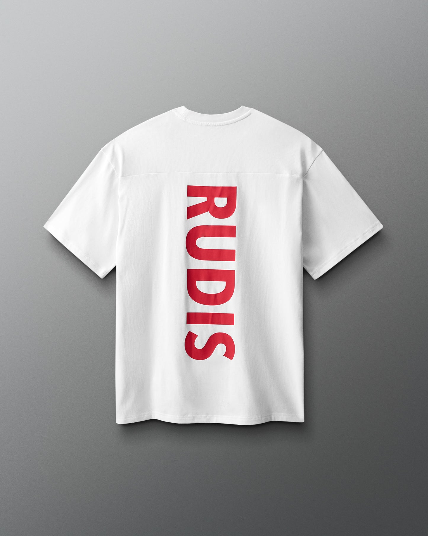 White t-shirt with red 'RUDIS' logo on a gray background