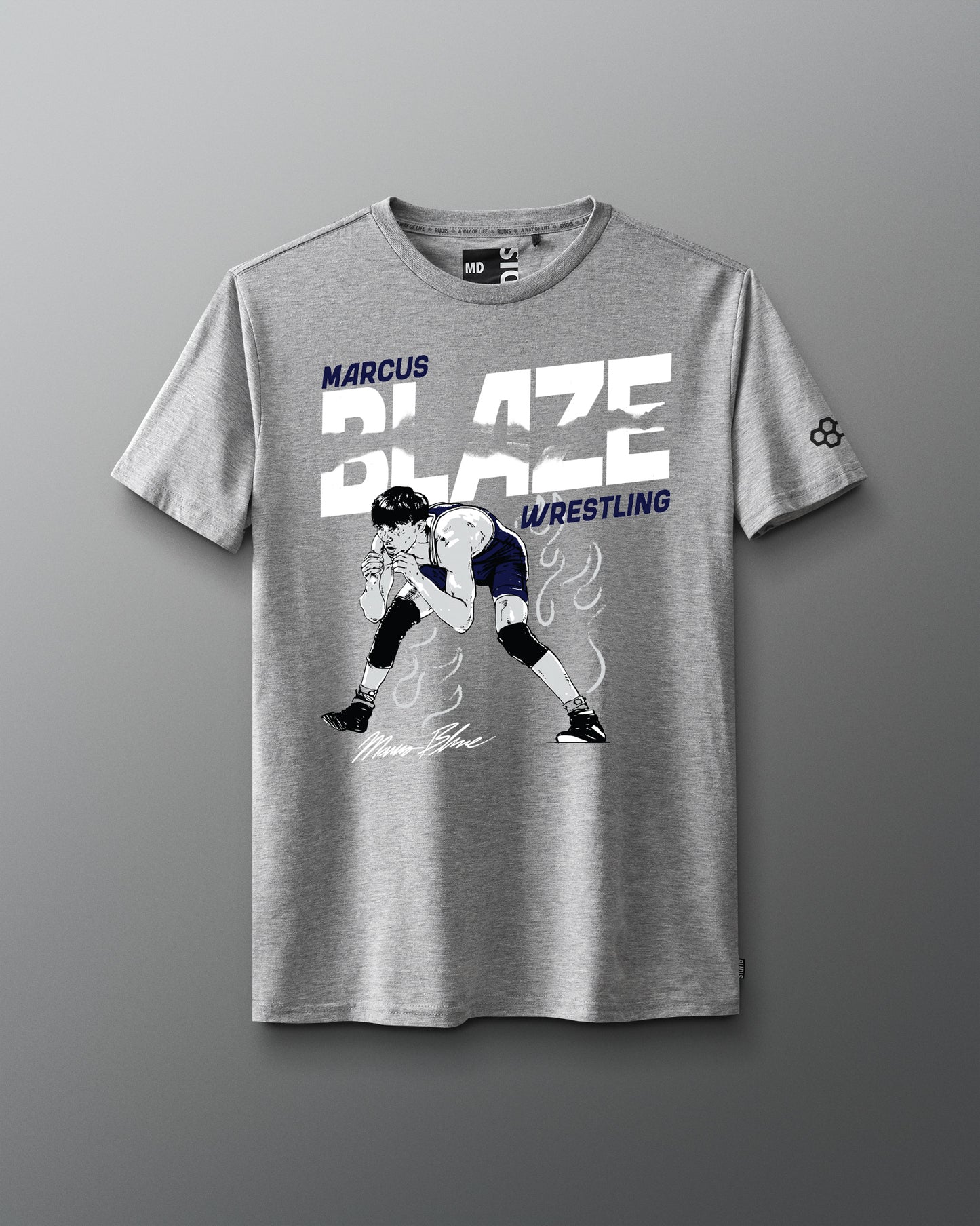 Gray t-shirt with wrestling graphic and text on a gray background
