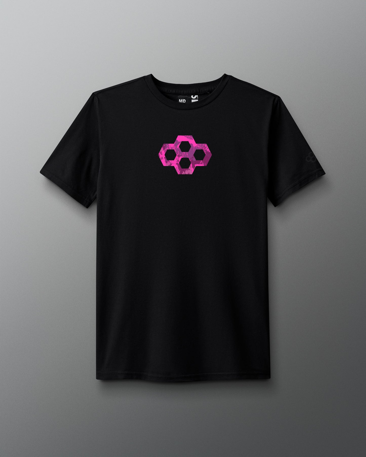 Black t-shirt with a pink geometric design on a gray background